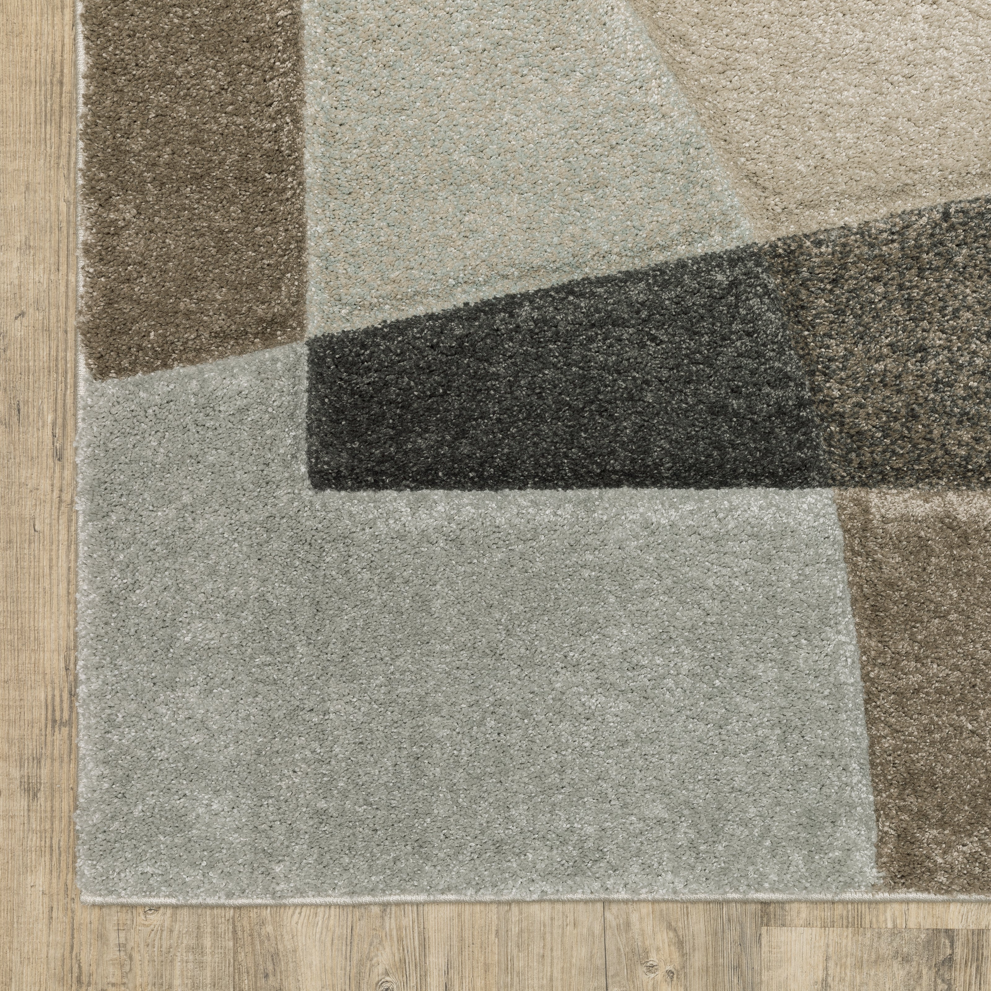 Oriental Weavers Cambria 084J2 plush modern rug featuring abstract pattern in beige/ multi tones