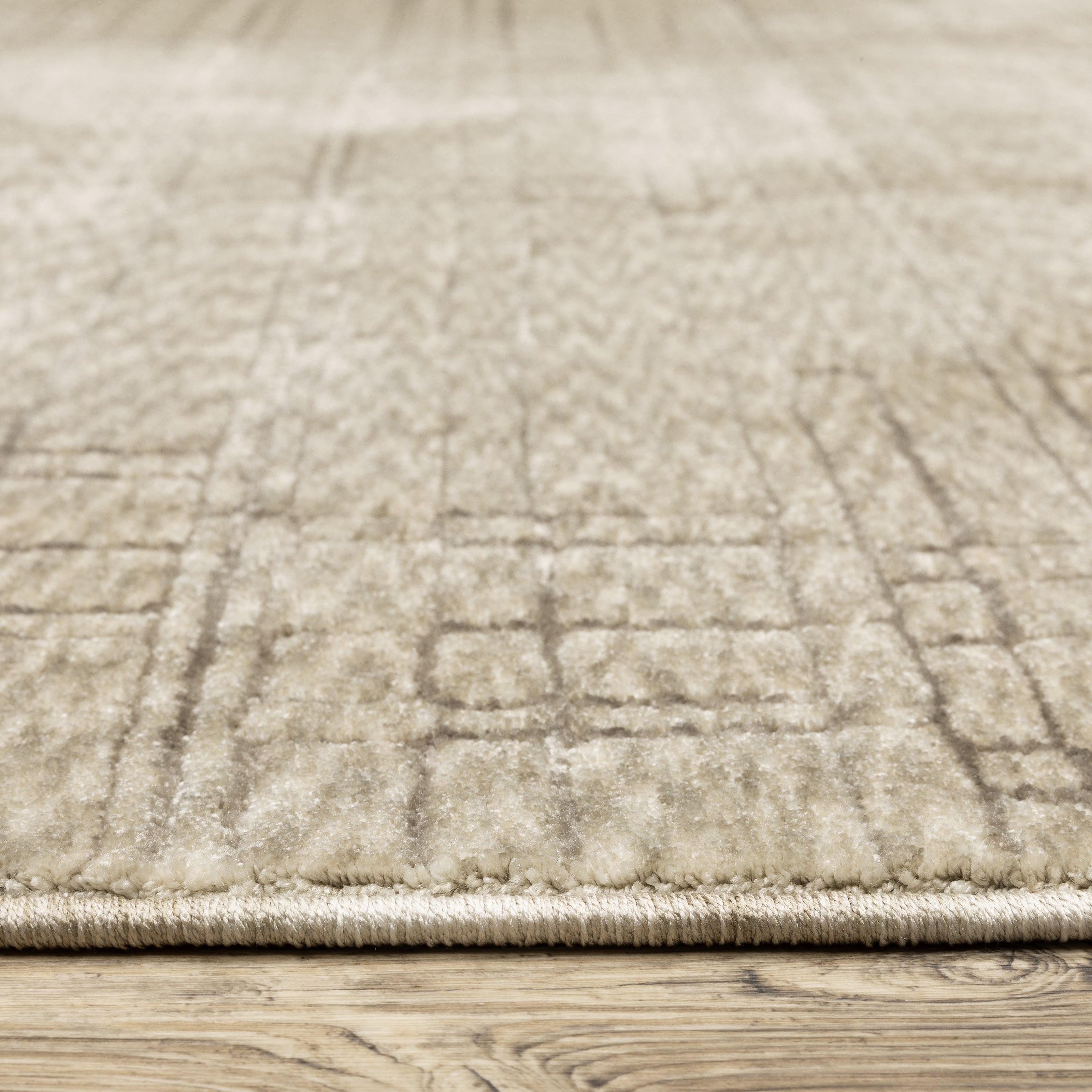 Oriental Weavers Capella CAP07 soft transitional rug featuring textured design in beige/ brown tones