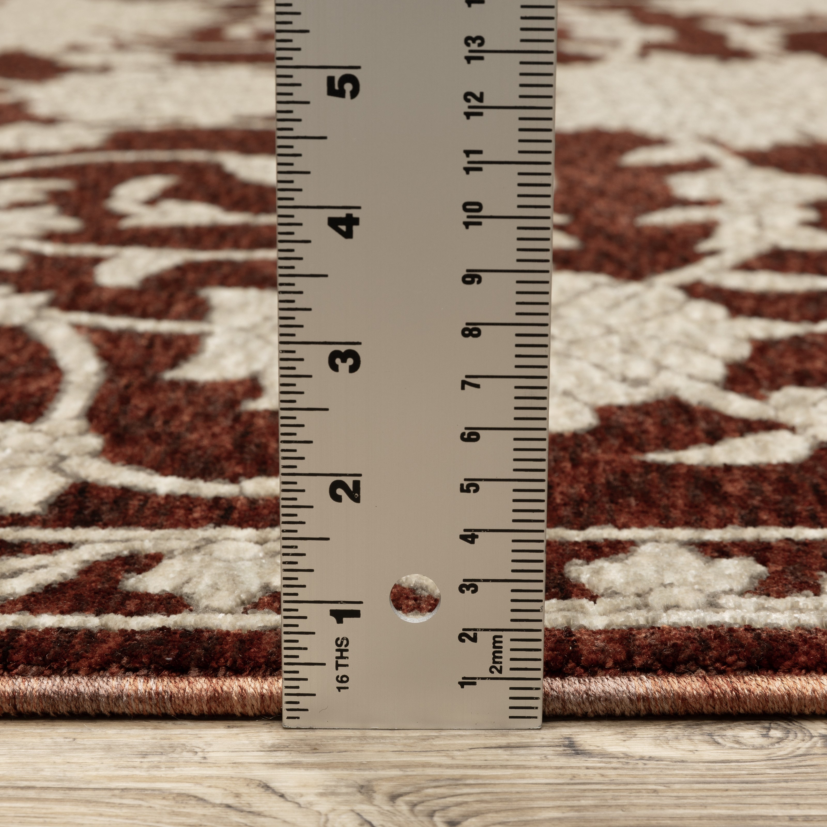 Oriental Weavers Capella CAP08 soft transitional rug featuring textured design in rust red/ beige tones