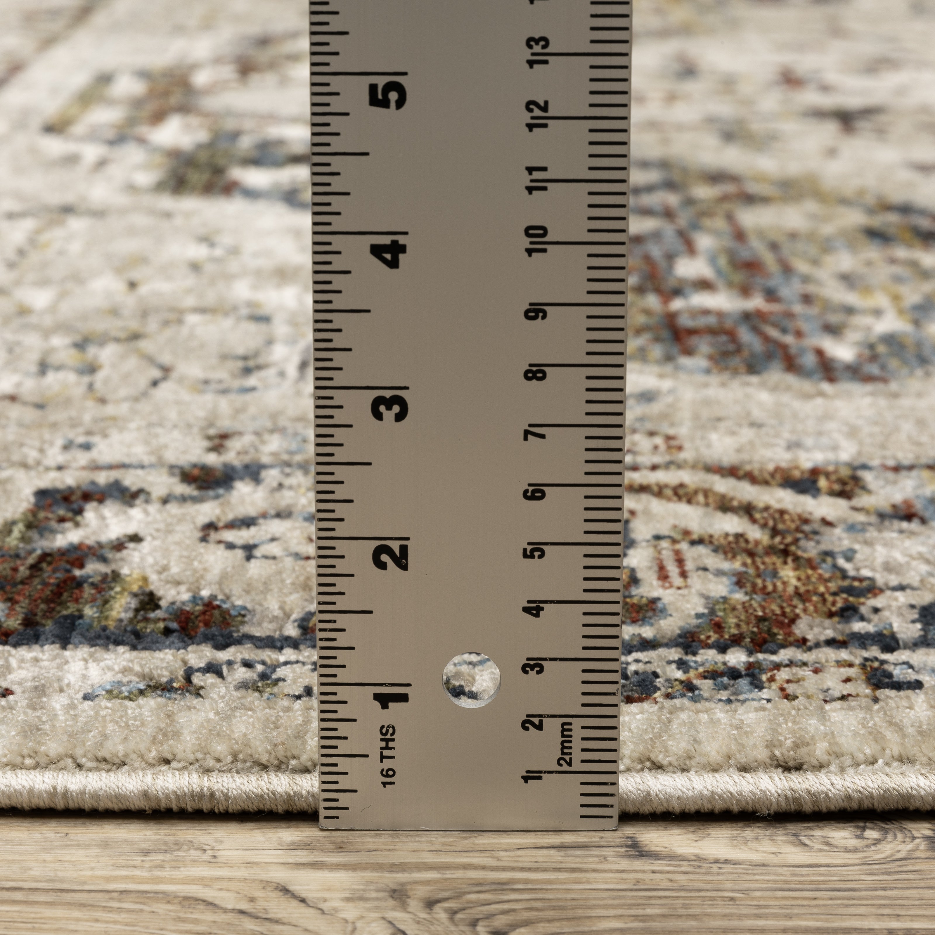 Oriental Weavers Capella CAP12 soft transitional rug featuring textured design in beige/ multi tones