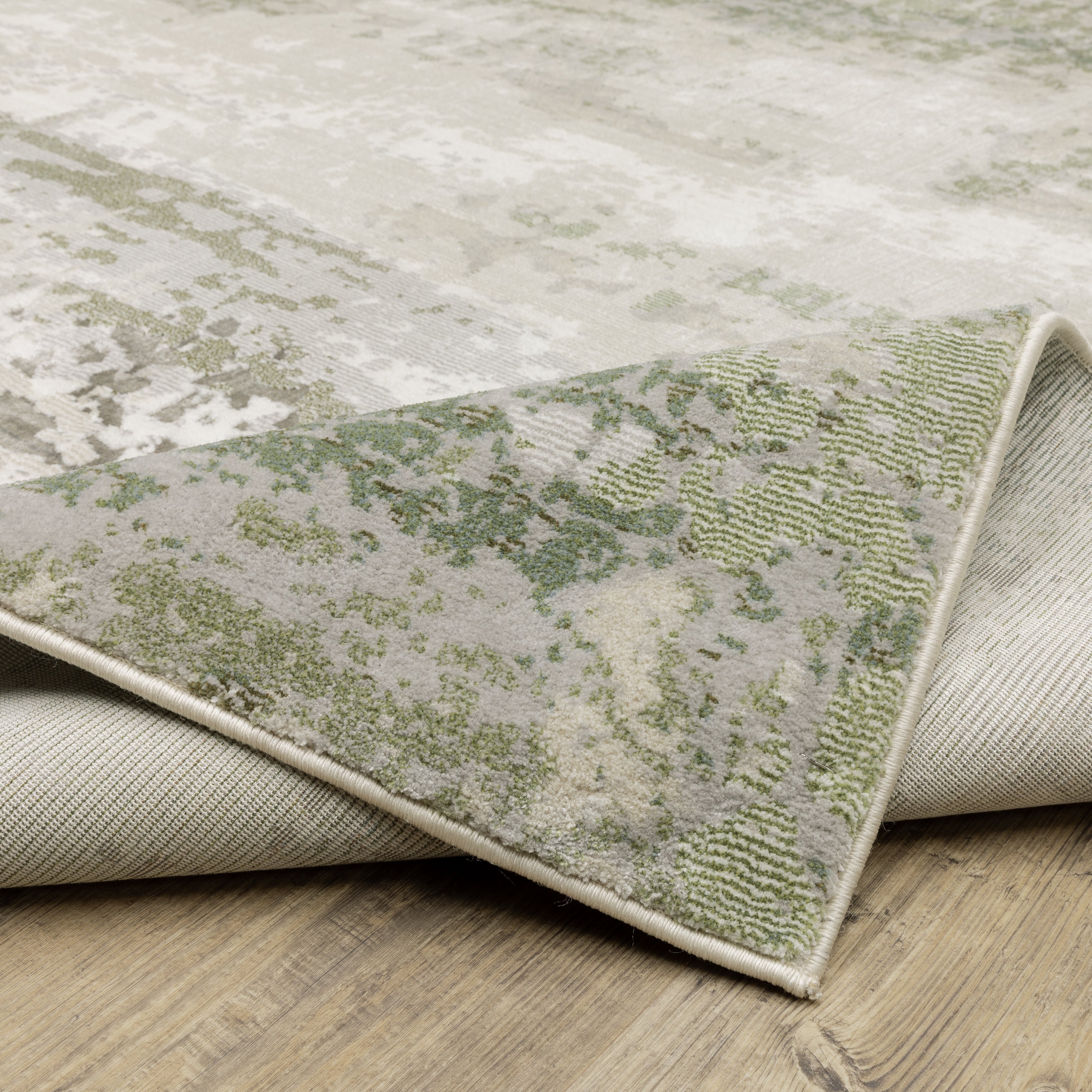 Oriental Weavers Caravan 2061W soft area rug featuring textured design in beige/ green tones