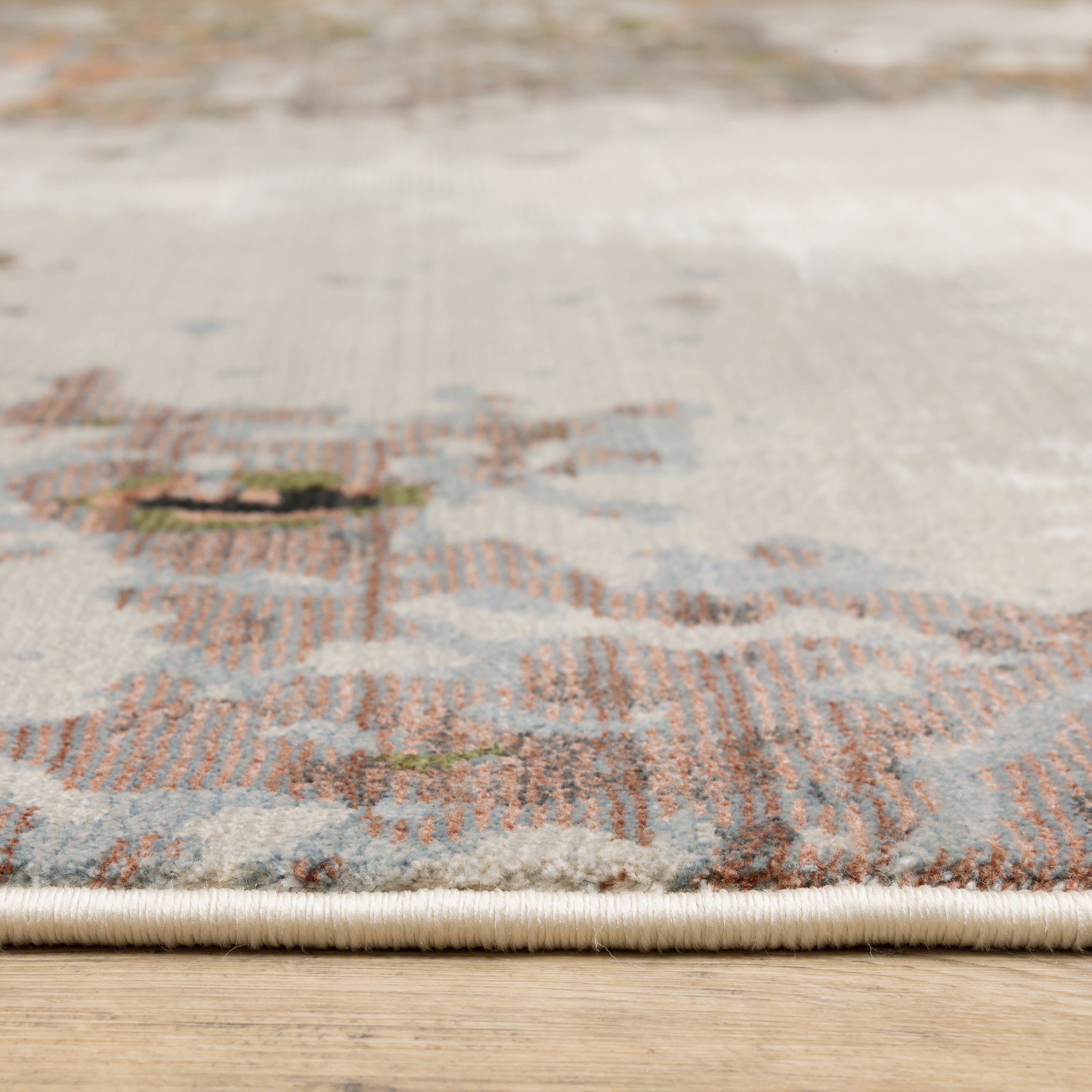 Oriental Weavers Caravan 4150Z soft modern rug featuring textured design in grey/ pink tones