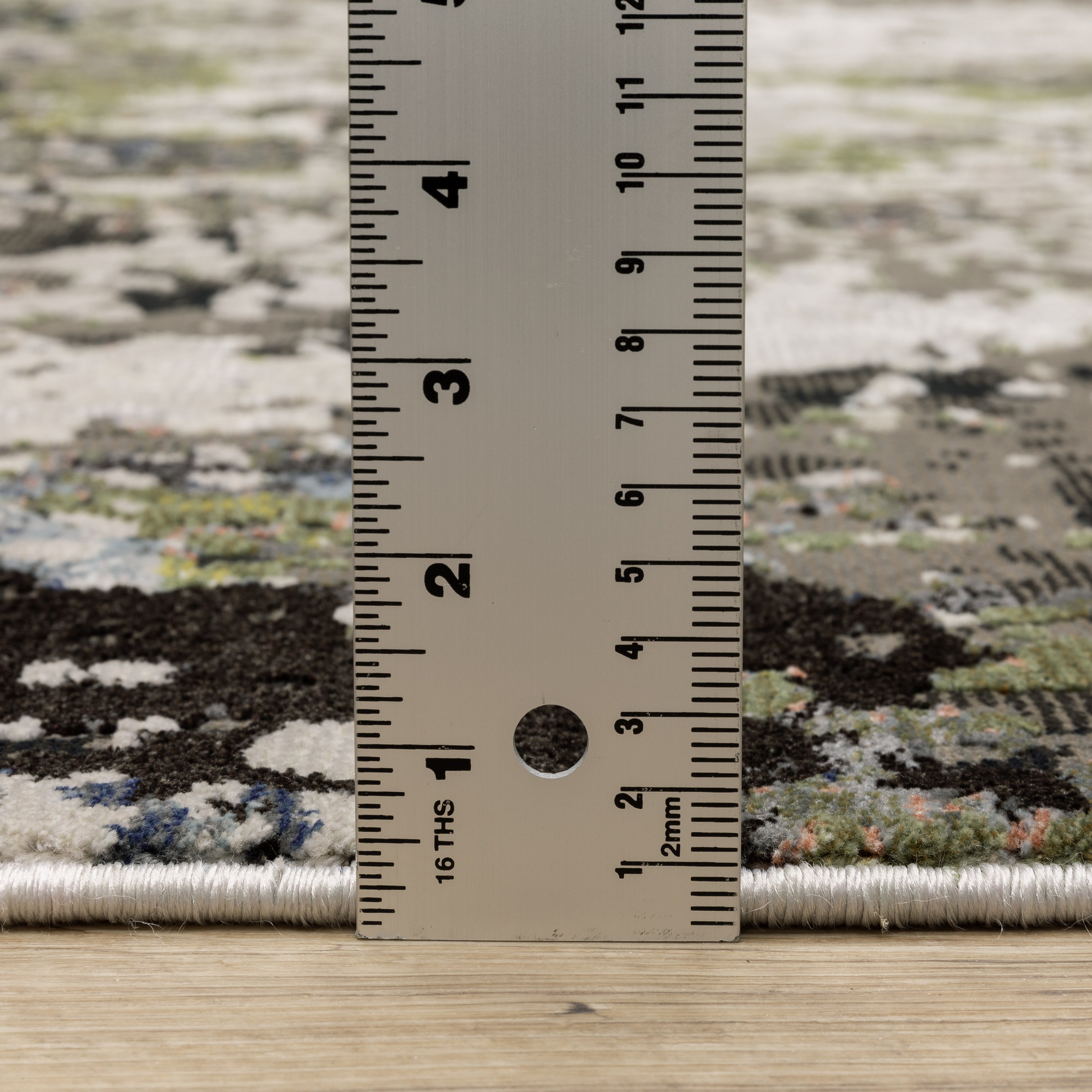 Oriental Weavers Caravan 502Z8 soft area rug featuring textured design in grey/ green tones