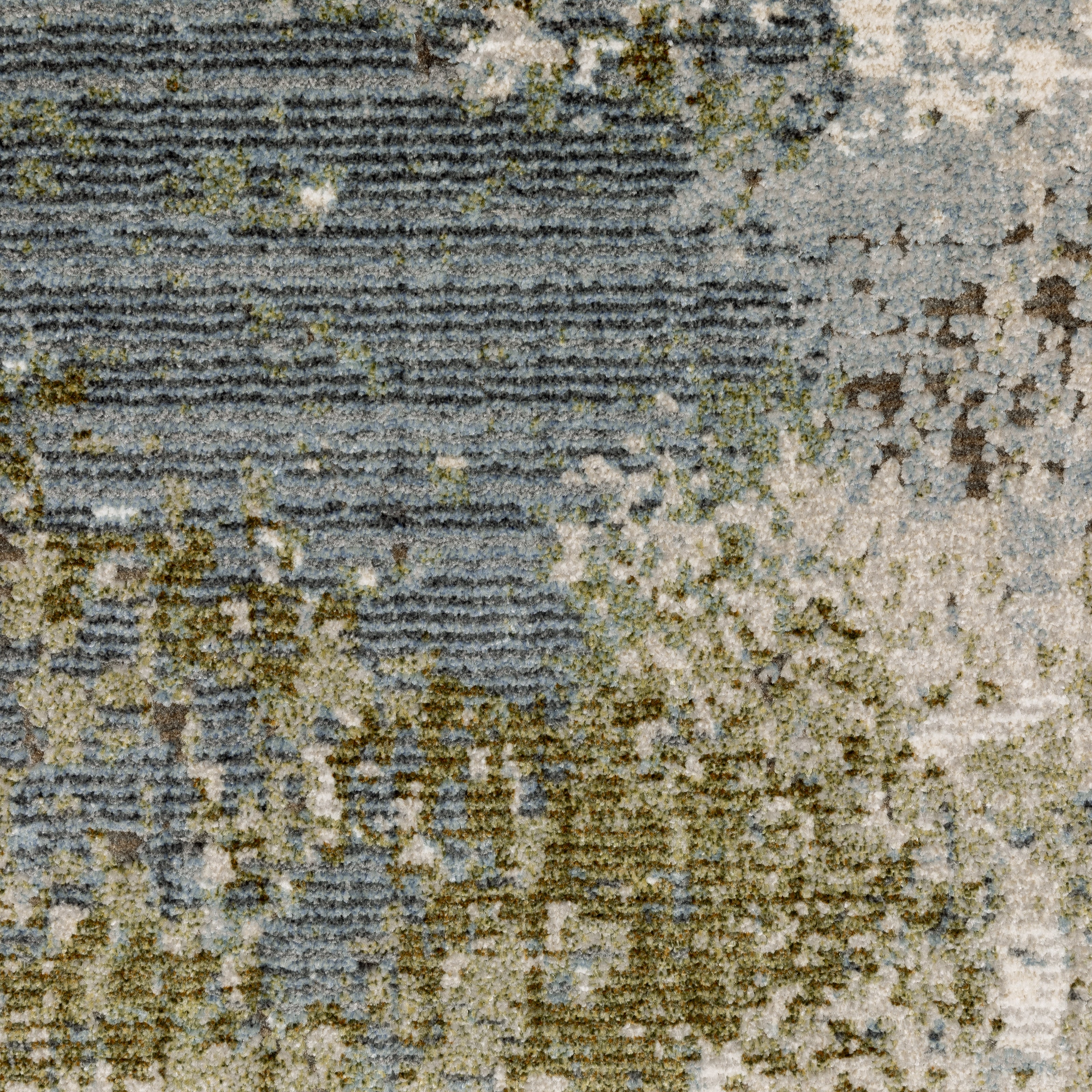 Oriental Weavers Caravan 5090E soft area rug featuring textured design in blue/ green tones