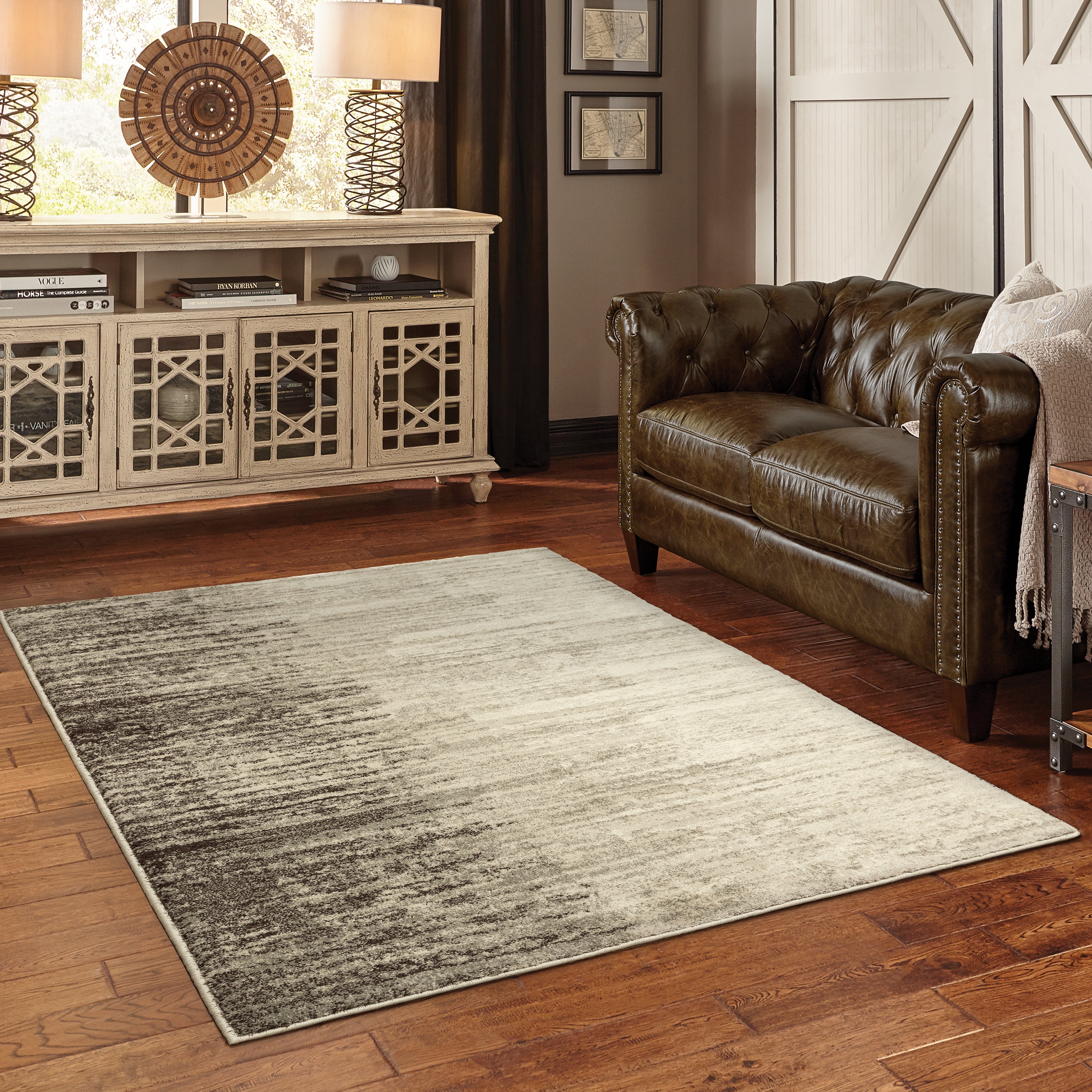 Oriental Weavers Carson 0735A plush modern rug featuring abstract pattern in beige/ grey tones