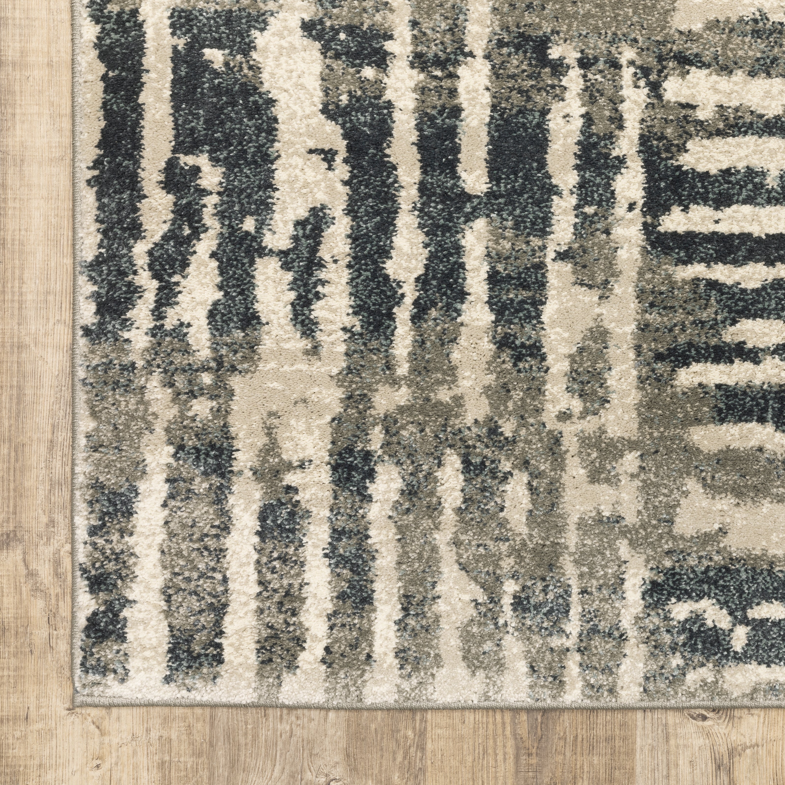 Oriental Weavers Carson 0745C plush modern rug featuring abstract pattern in blue/ beige tones