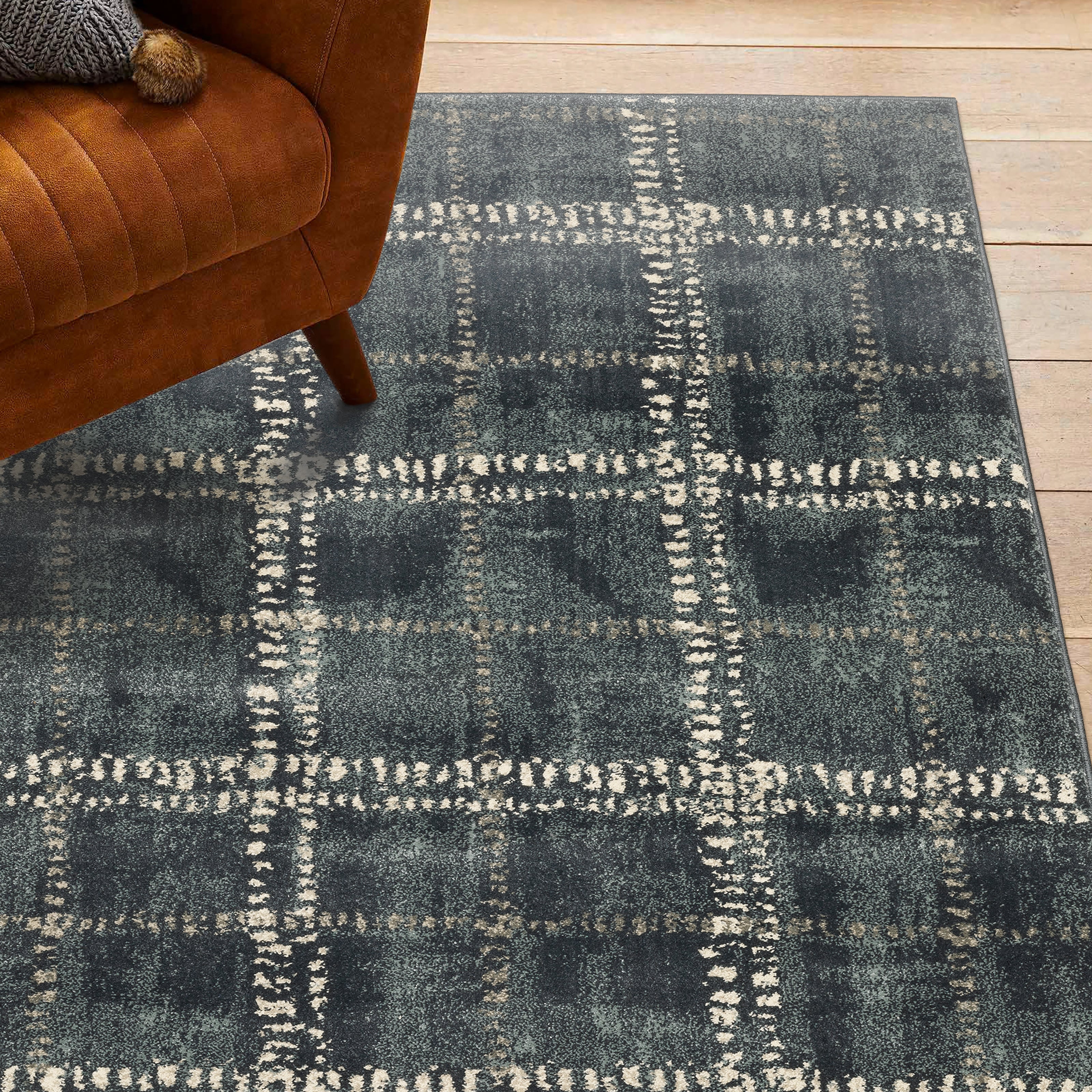 Oriental Weavers Carson 0746J plush modern rug featuring abstract pattern in blue/ ivory tones