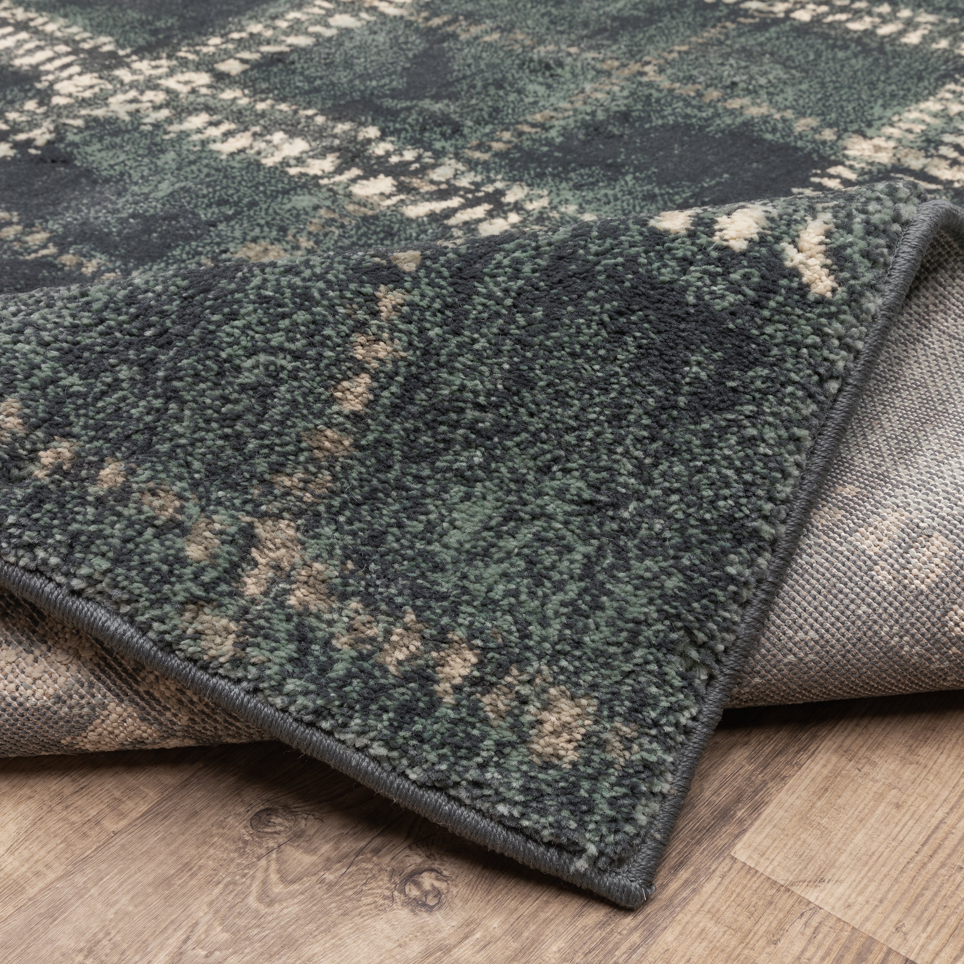 Oriental Weavers Carson 0746J plush modern rug featuring abstract pattern in blue/ ivory tones