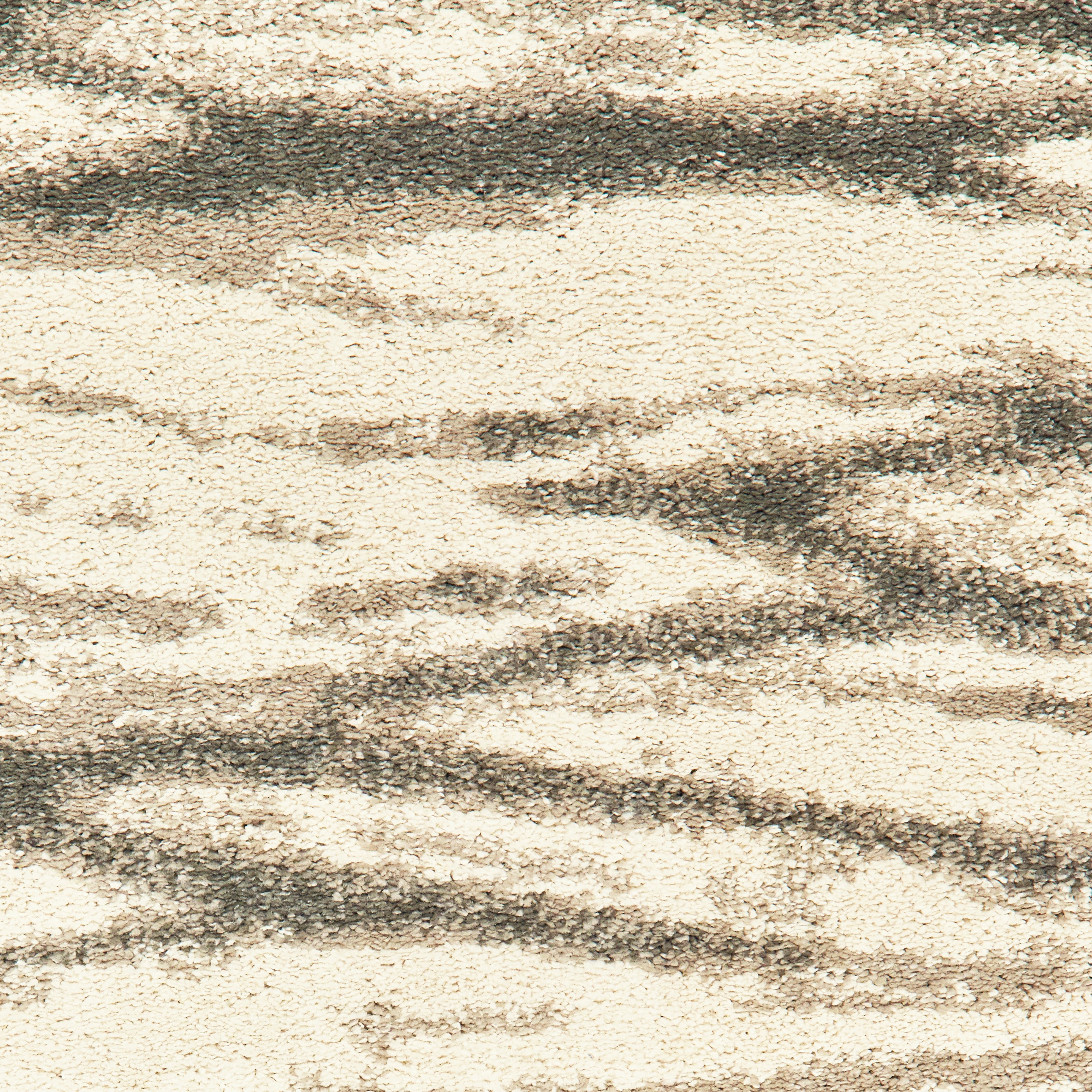 Oriental Weavers Carson 9671C plush modern rug featuring abstract pattern in ivory/ sand tones
