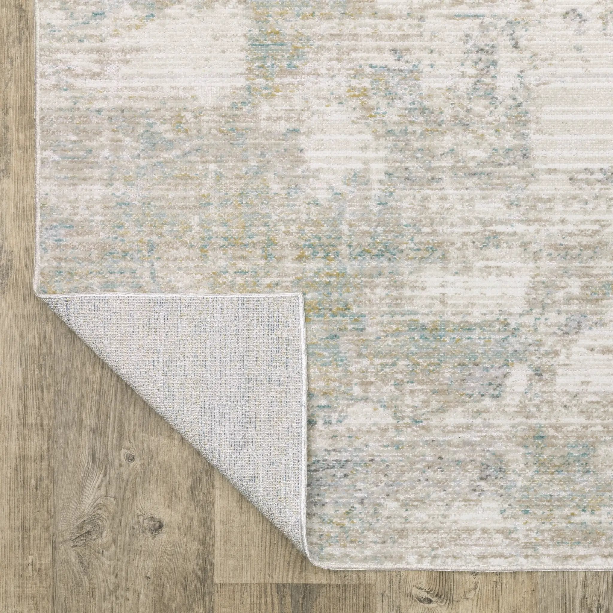 Cavett CAV01 Ivory/ Teal Area Rug by Oriental Weavers