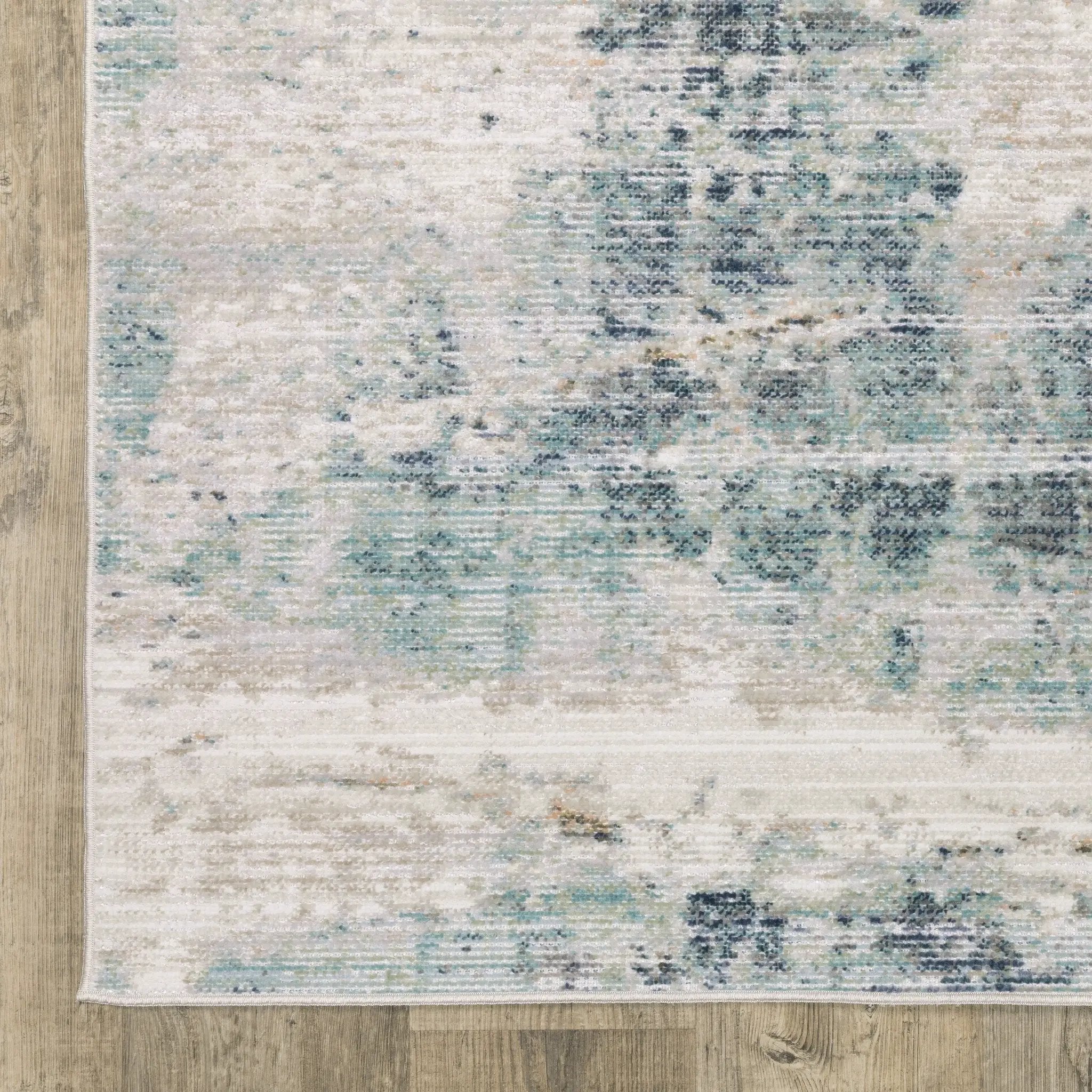 Cavett CAV03 Ivory/ Blue Area Rug by Oriental Weavers
