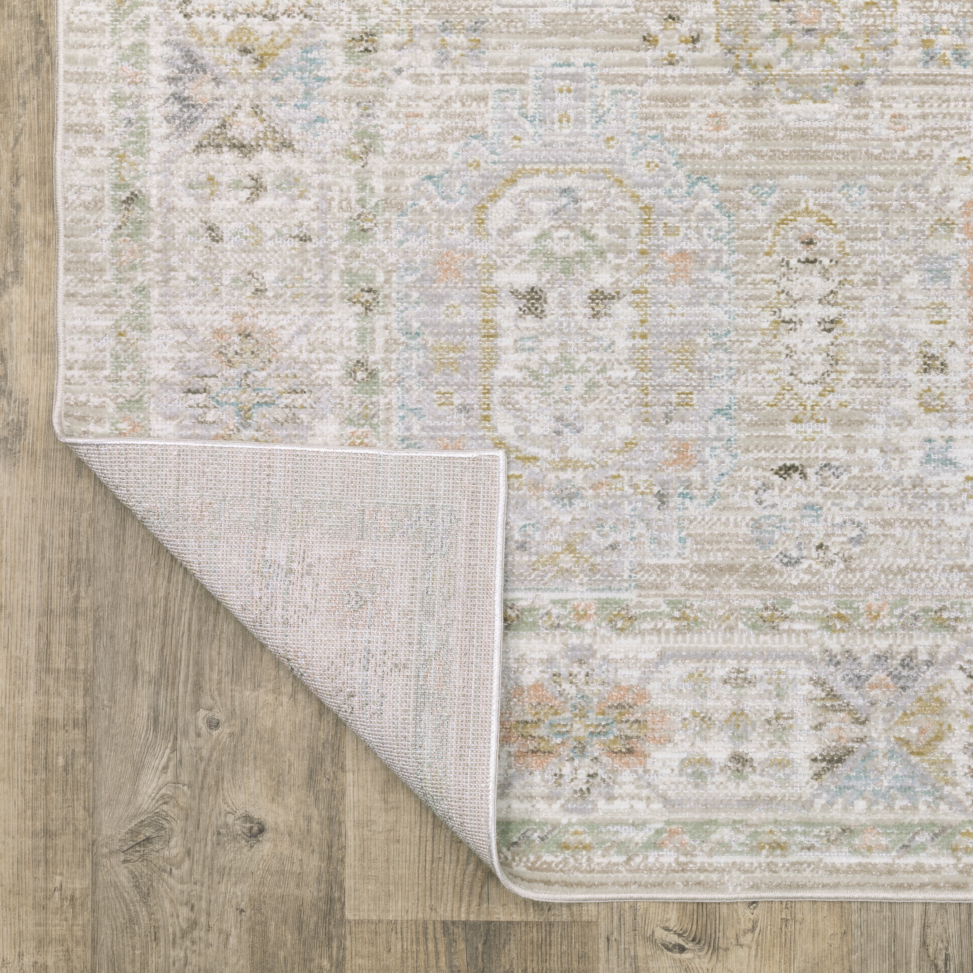 Oriental Weavers Cavett CAV04 soft transitional rug featuring decorative pattern in beige/ blue tones