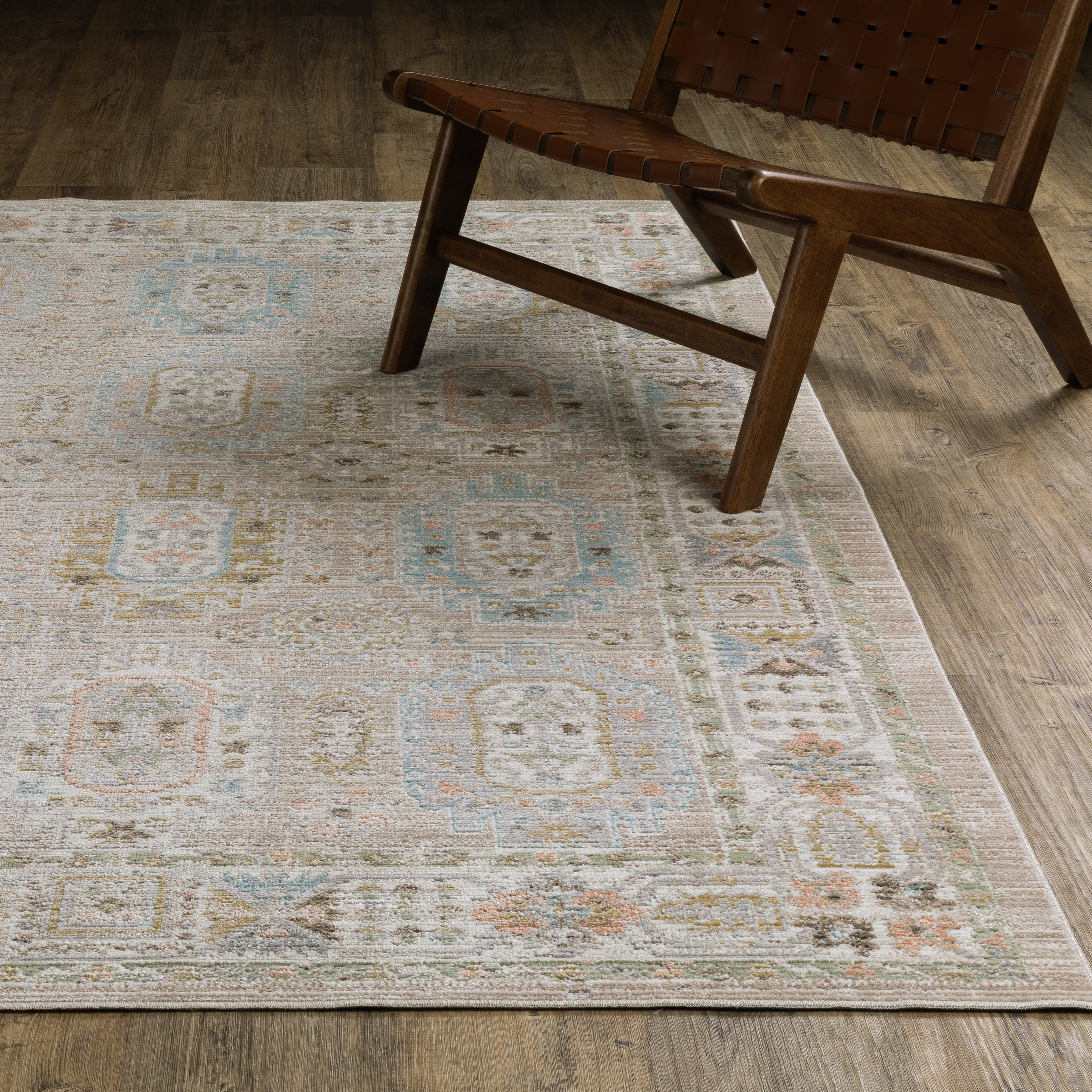 Oriental Weavers Cavett CAV04 soft transitional rug featuring decorative pattern in beige/ blue tones