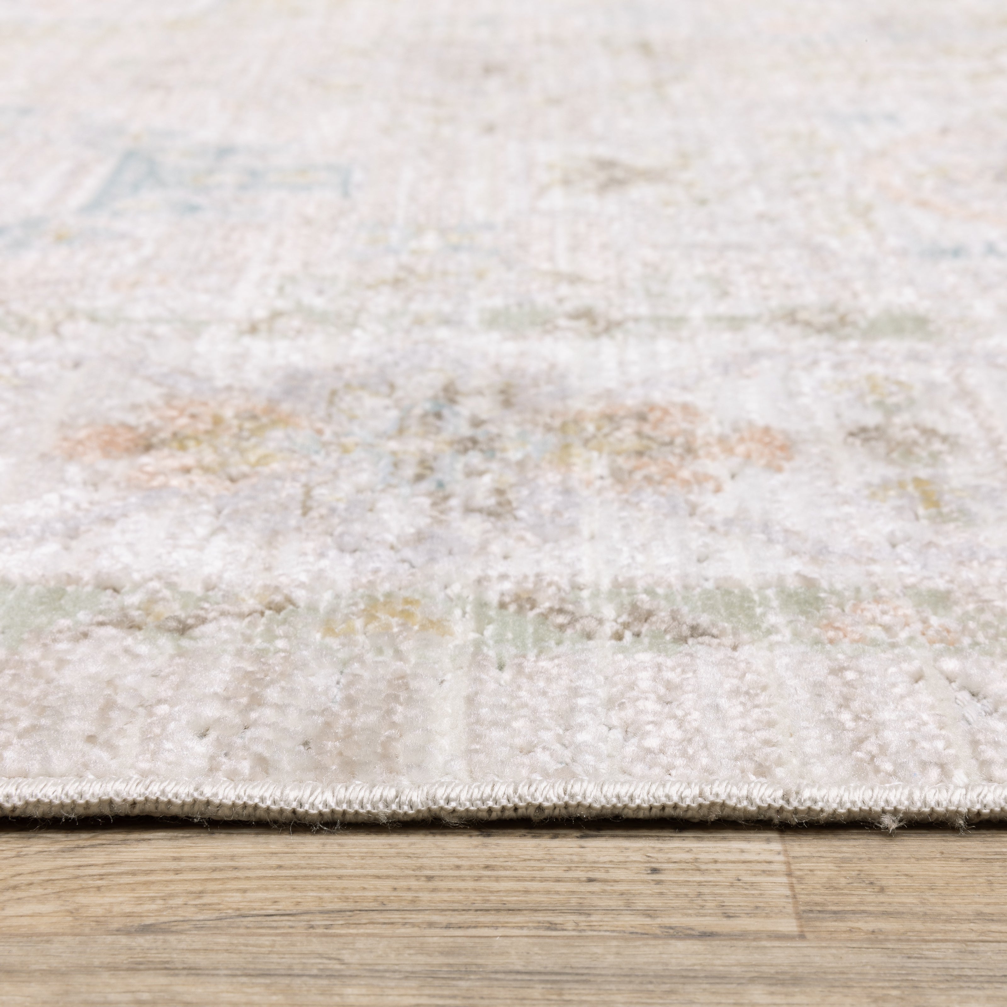 Oriental Weavers Cavett CAV04 soft transitional rug featuring decorative pattern in beige/ blue tones