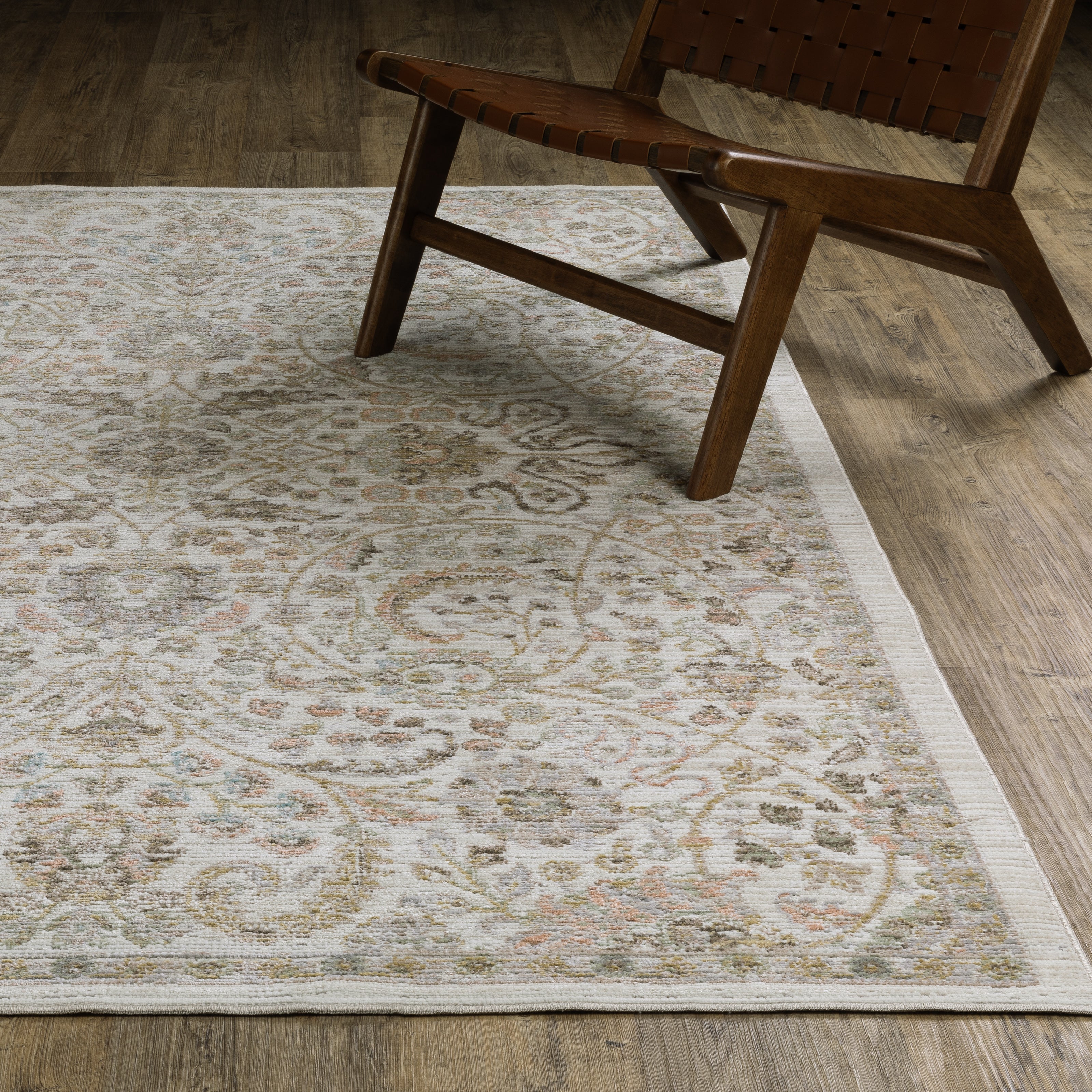 Oriental Weavers Cavett CAV05 soft transitional rug featuring decorative pattern in ivory/ gold tones