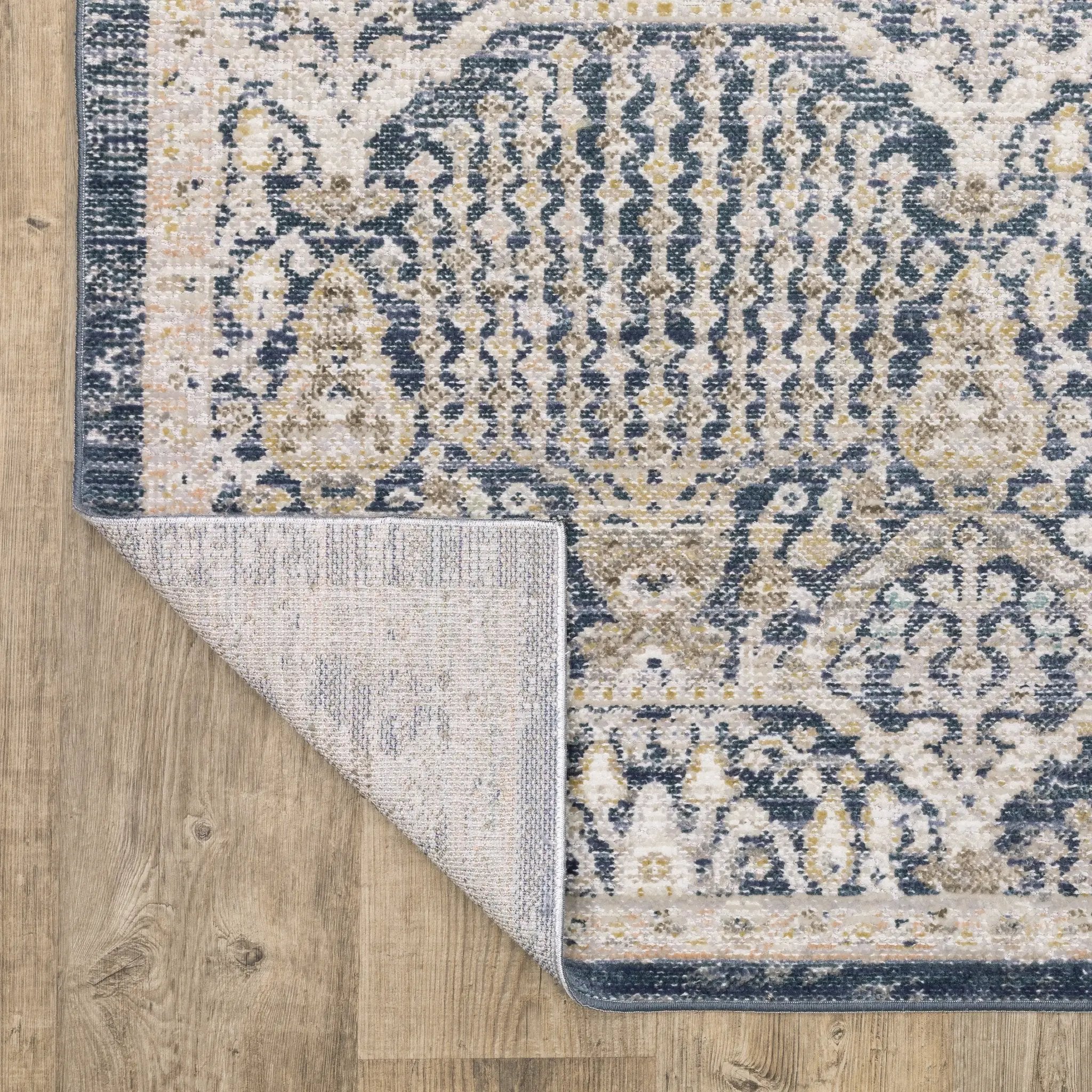 Cavett CAV06 Navy/ Gold Area Rug by Oriental Weavers