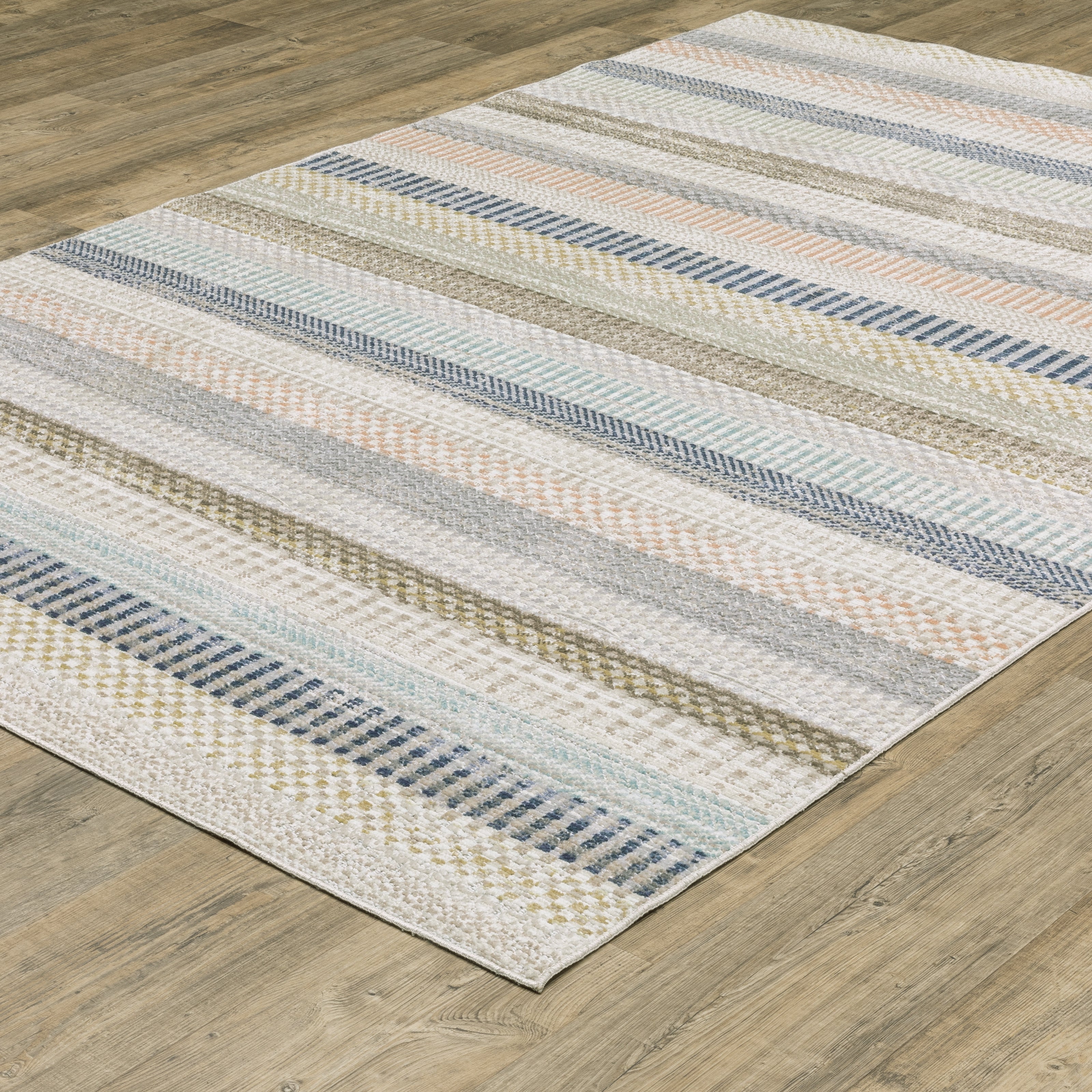 Oriental Weavers Cavett CAV08 soft transitional rug featuring decorative pattern in ivory/ multi tones