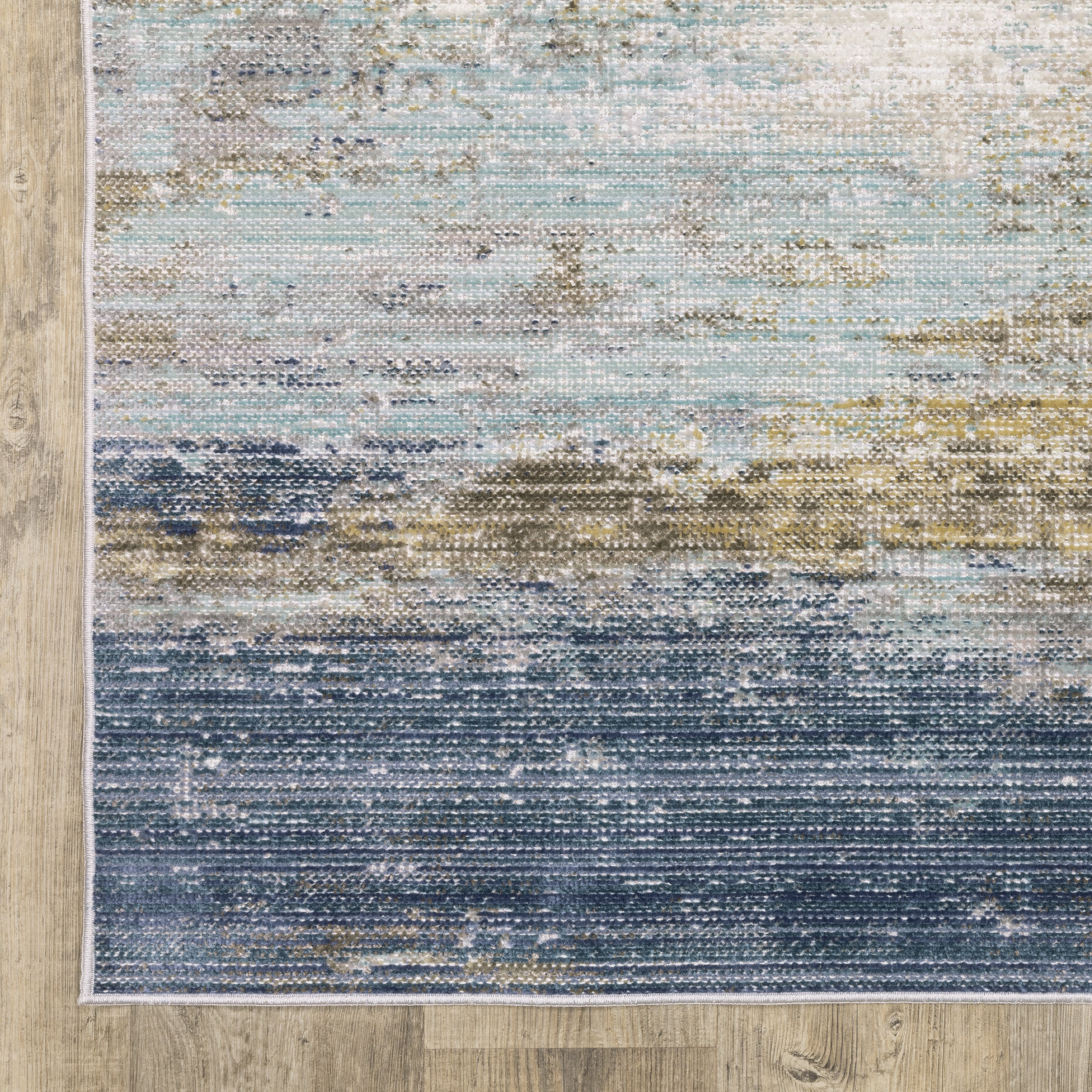 Oriental Weavers Cavett CAV09 soft transitional rug featuring decorative pattern in blue/ beige tones