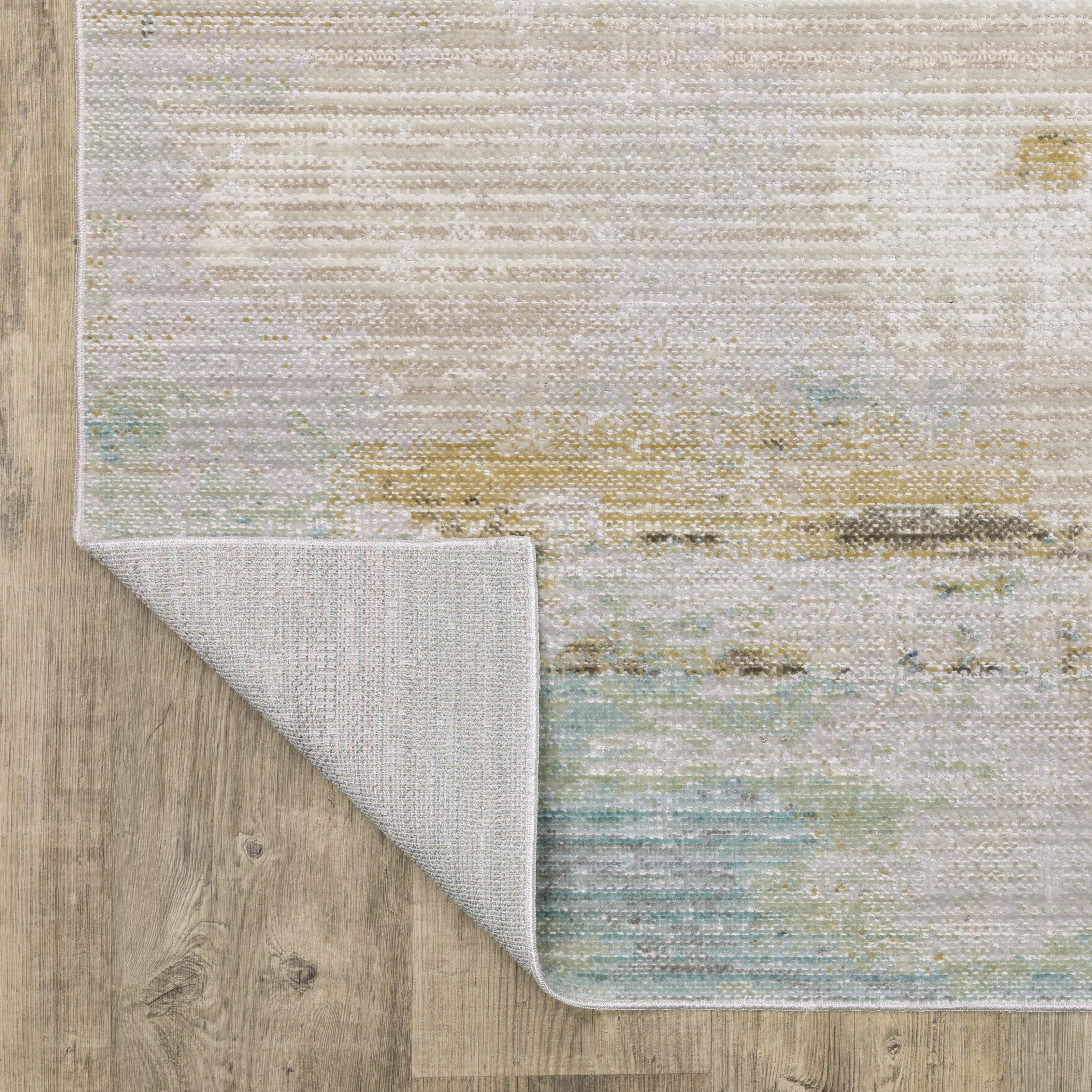 Oriental Weavers Cavett CAV09 soft transitional rug featuring decorative pattern in blue/ beige tones