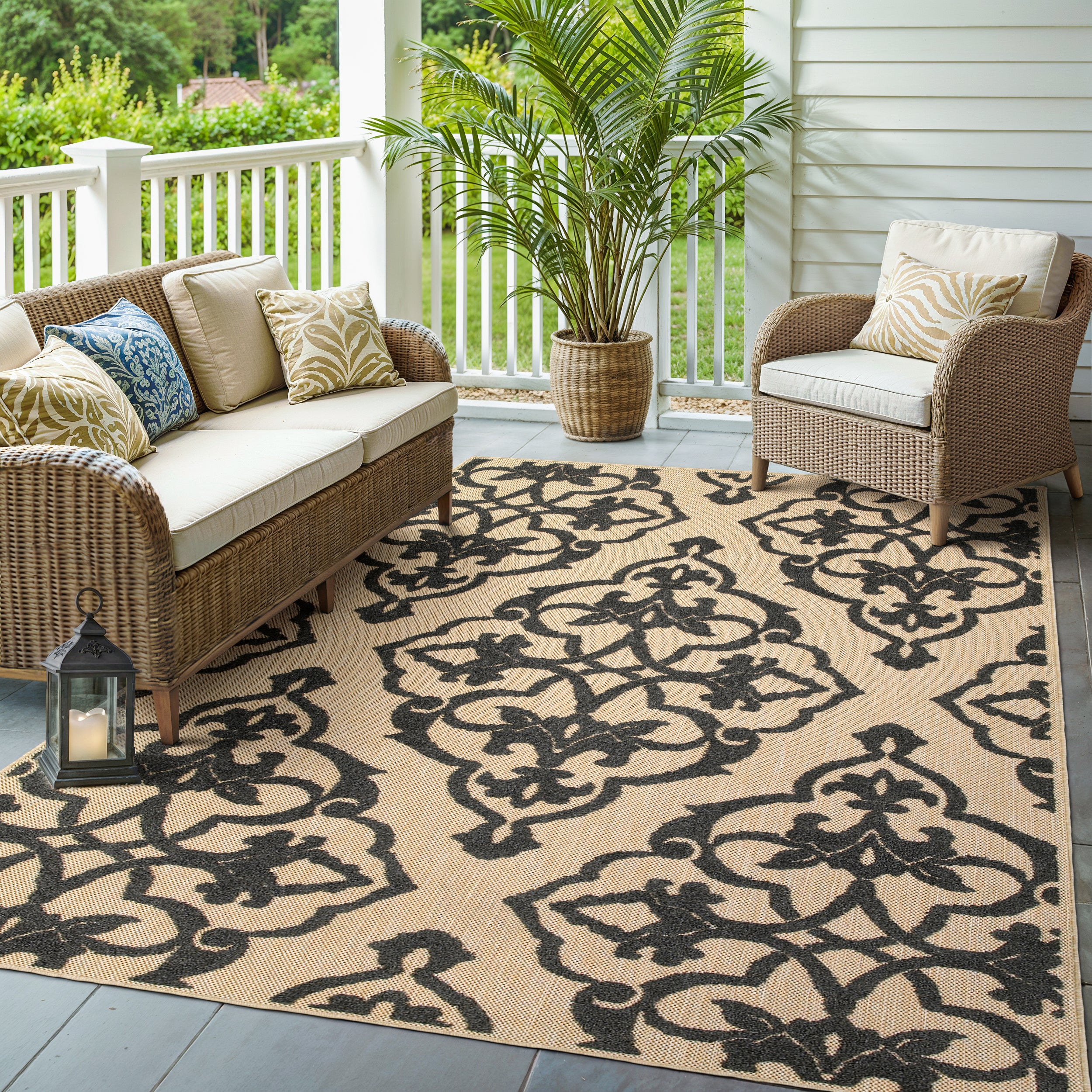 Oriental Weavers Cayman 001B9 textured indoor-outdoor rug featuring abstract pattern in sand/ charcoal tones