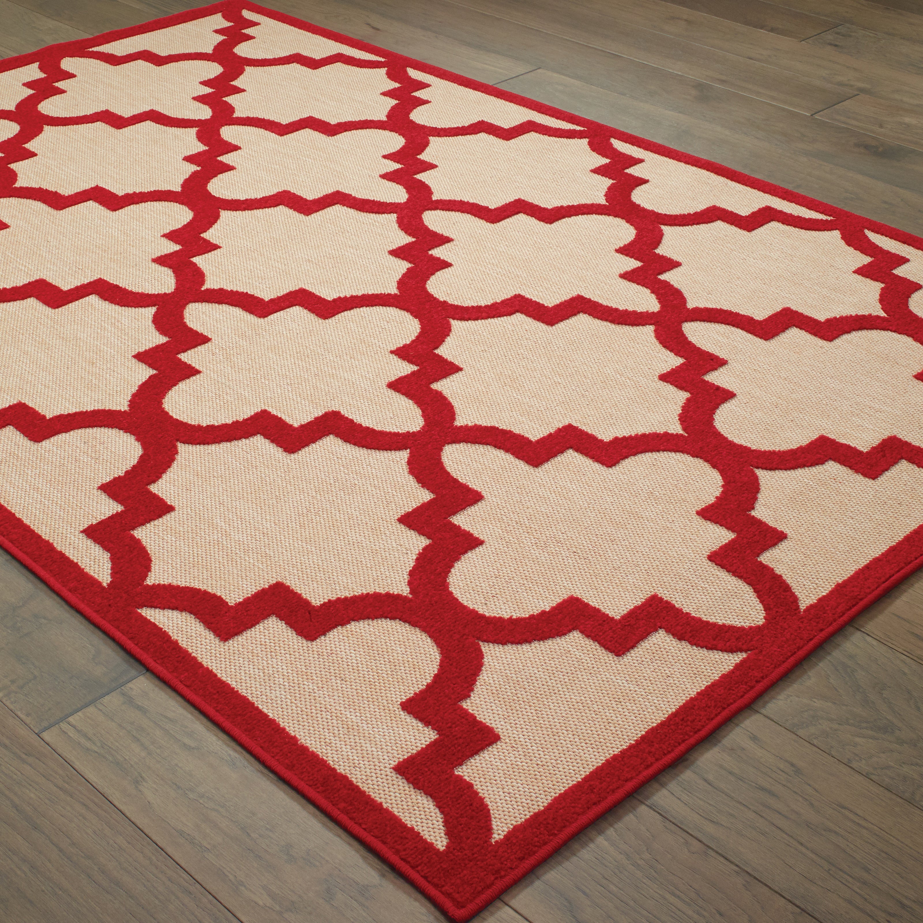 Oriental Weavers Cayman 660R9 textured indoor-outdoor rug featuring abstract pattern in sand/ red tones