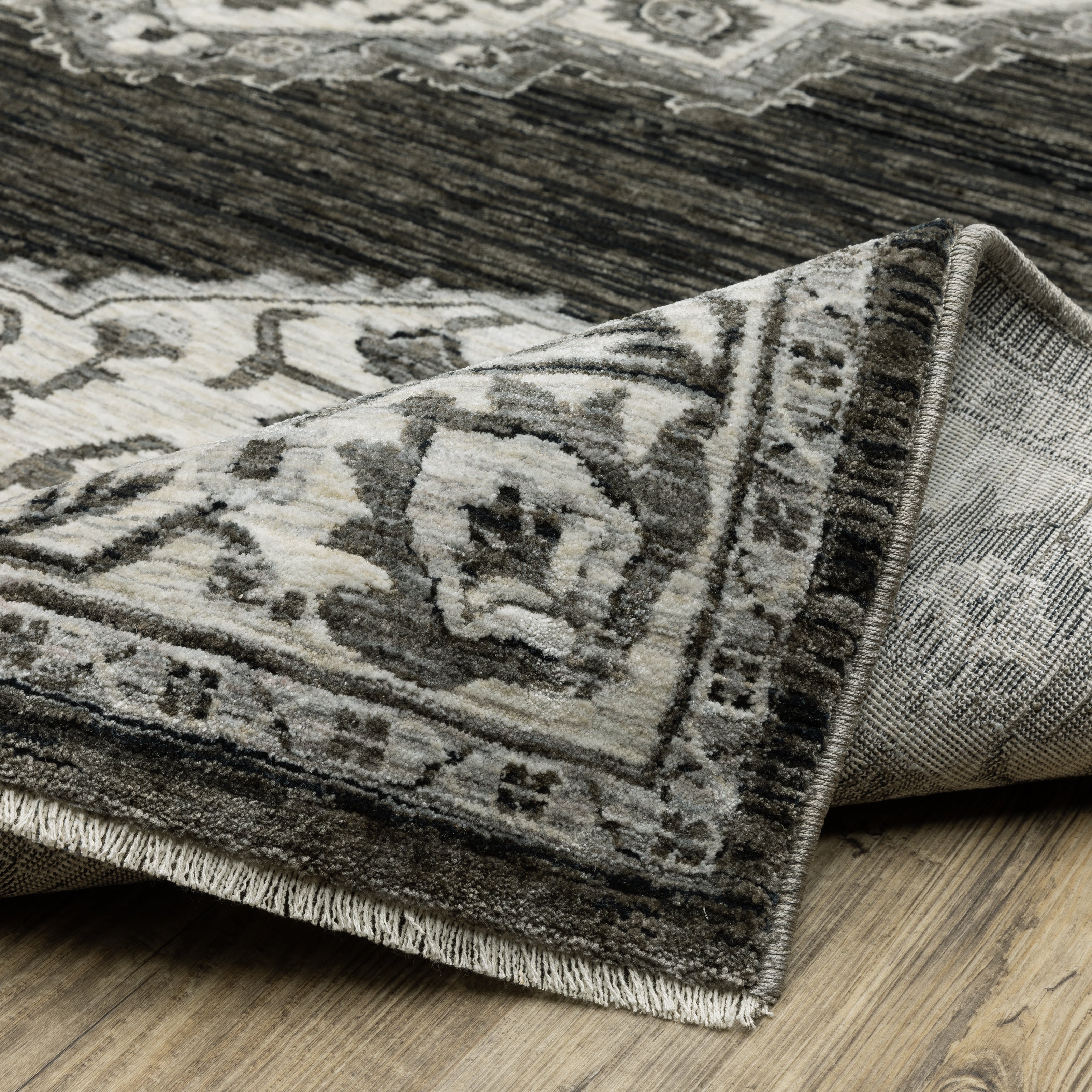 Oriental Weavers Chamberlain CH05C plush traditional rug featuring decorative pattern in charcoal/ ivory tones