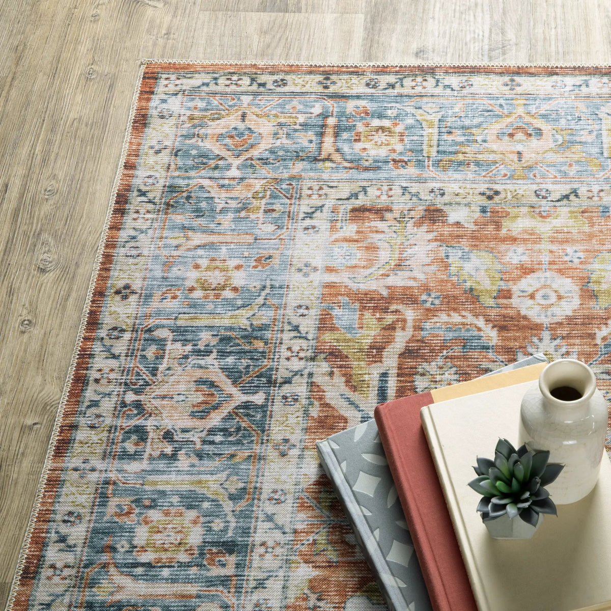 Charleston CHA04 Rust/ Blue Area Rug by Oriental Weavers