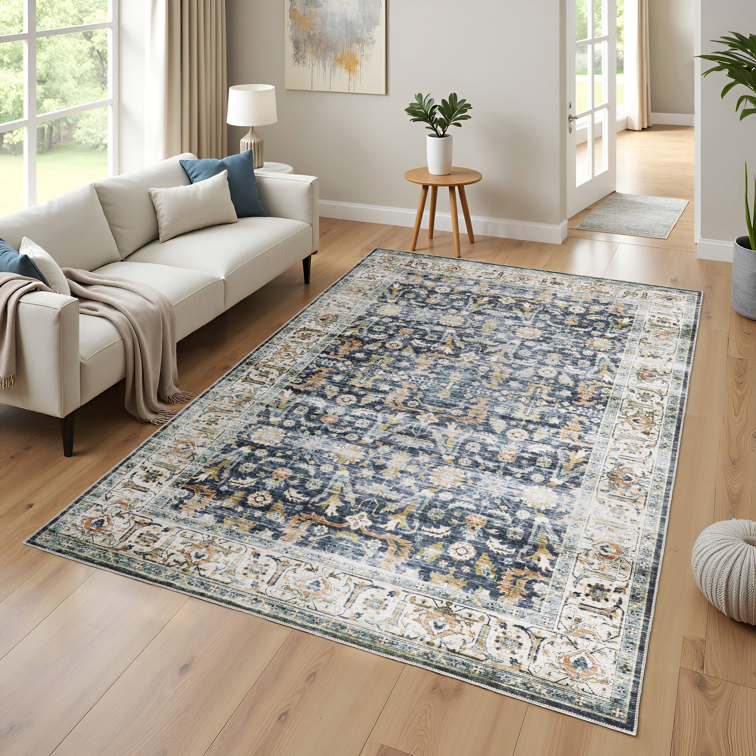 Oriental Weavers Charleston CHA05 traditional rug featuring decorative pattern in blue/ gold tones