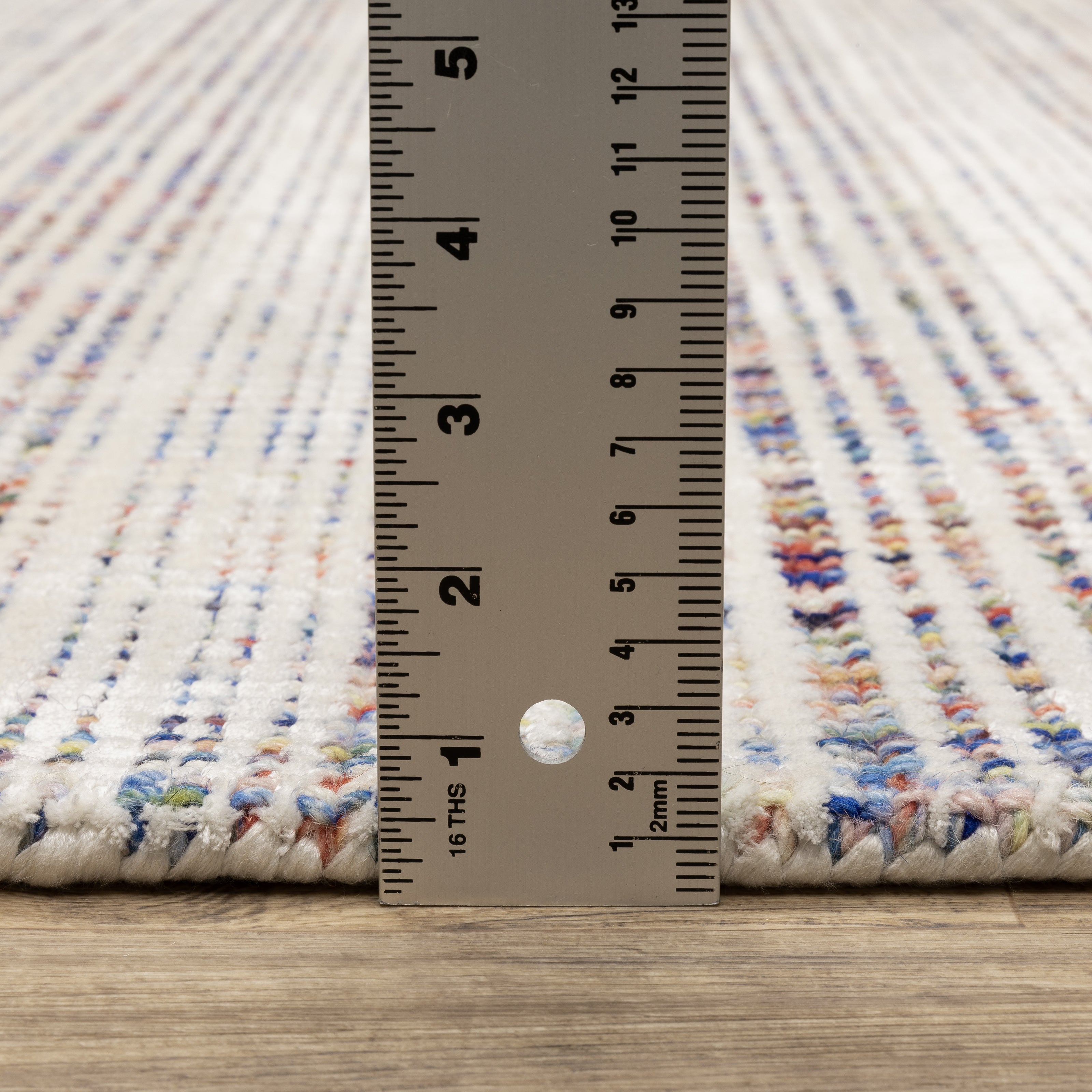 Oriental Weavers Circa CIR01 soft area rug featuring textured design in ivory/ multi tones