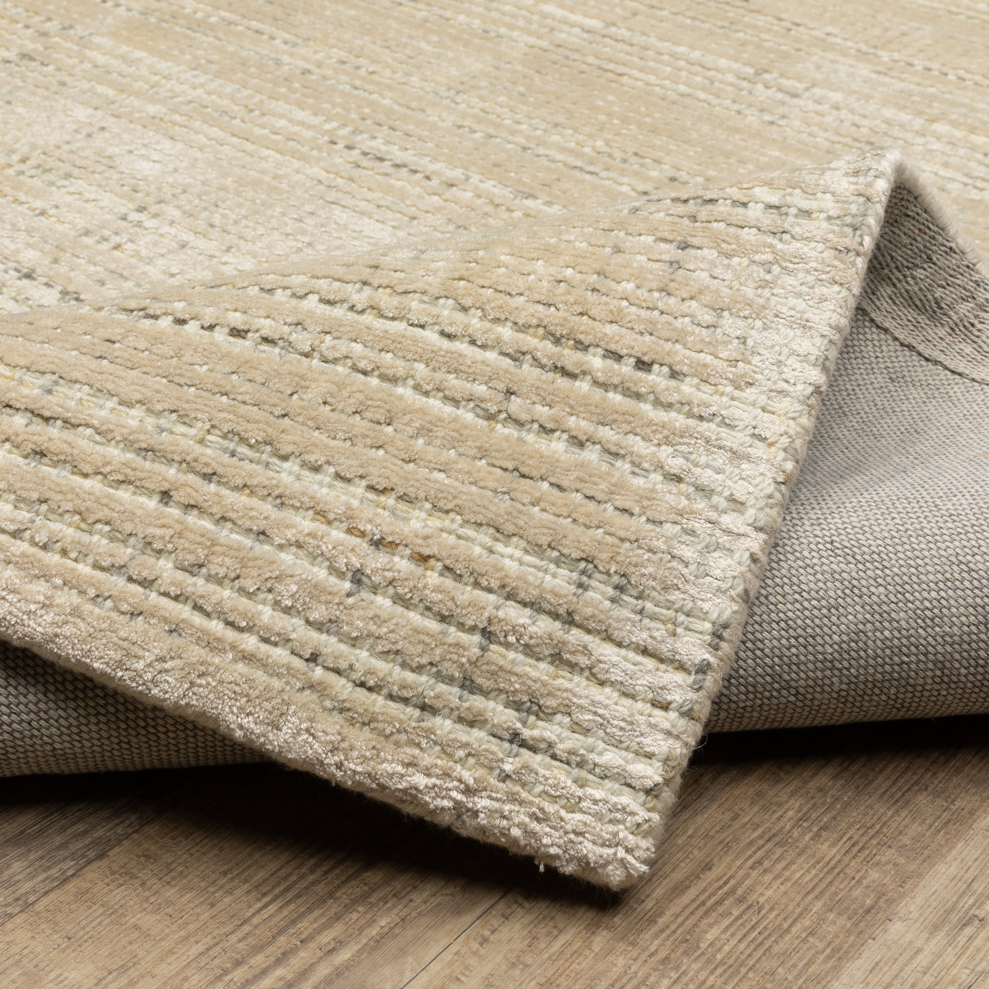 Oriental Weavers Circa CIR03 soft area rug featuring textured design in beige/ ivory tones