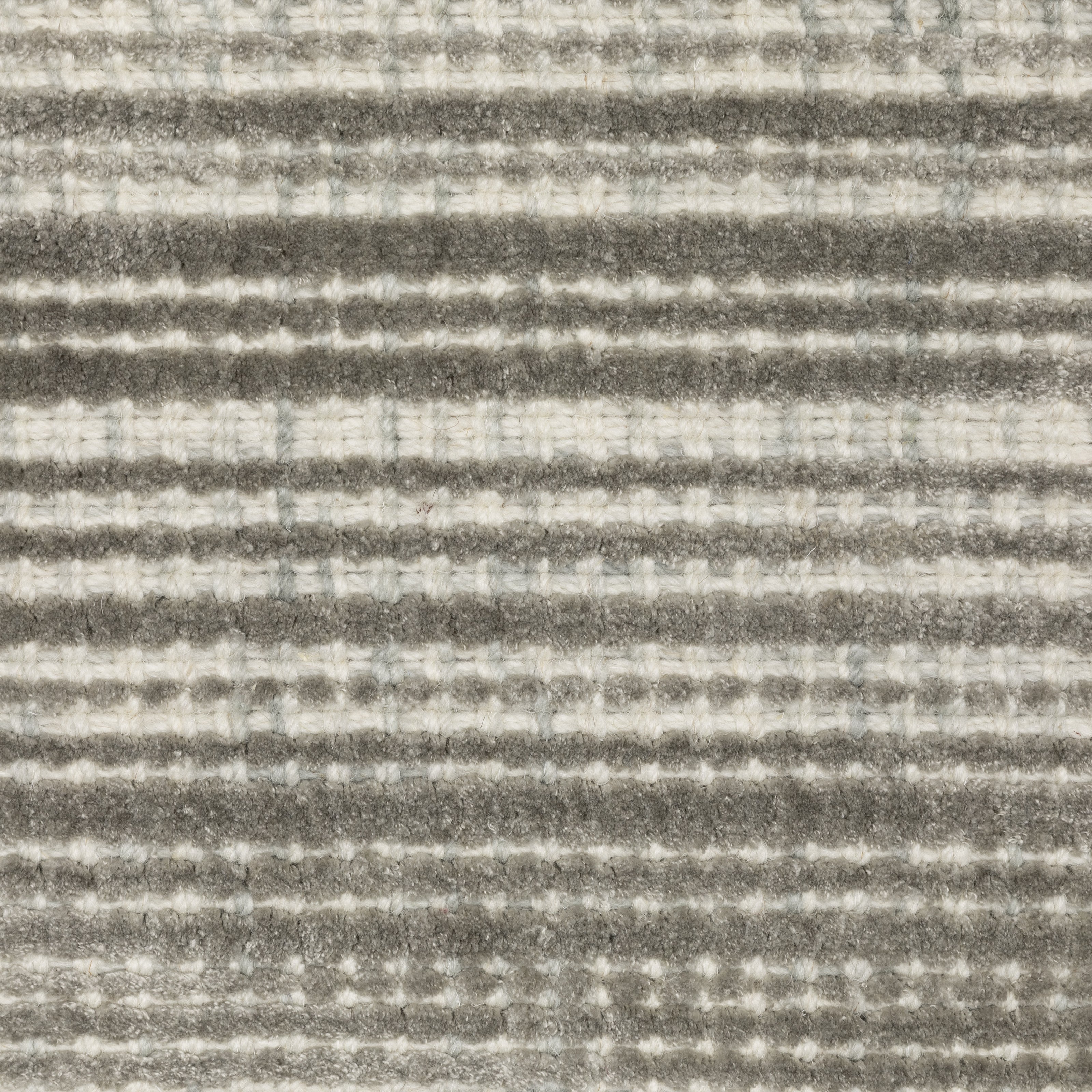 Oriental Weavers Circa CIR04 soft area rug featuring textured design in grey/ ivory tones