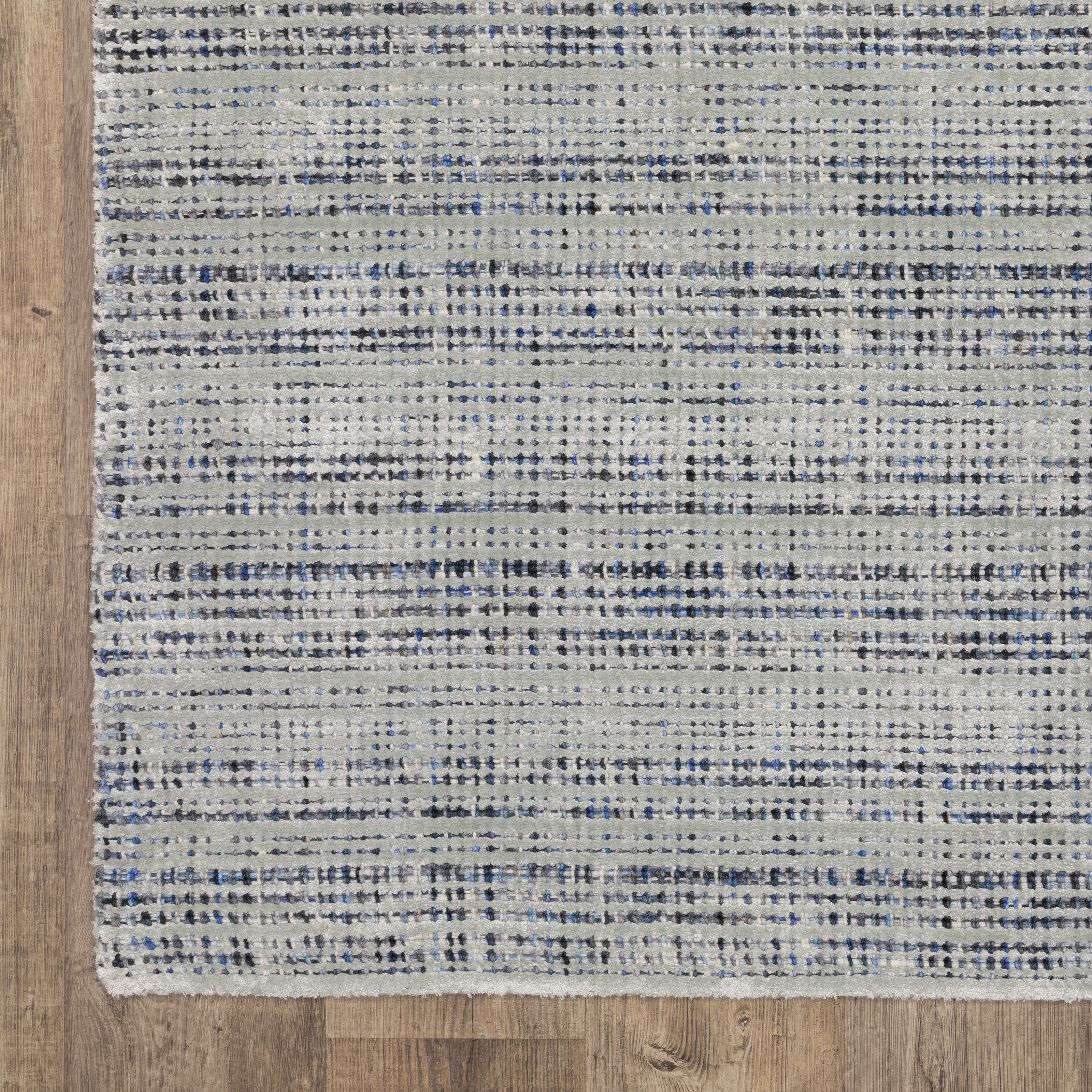 Oriental Weavers Circa CIR05 soft traditional rug featuring textured design in grey/ blue tones