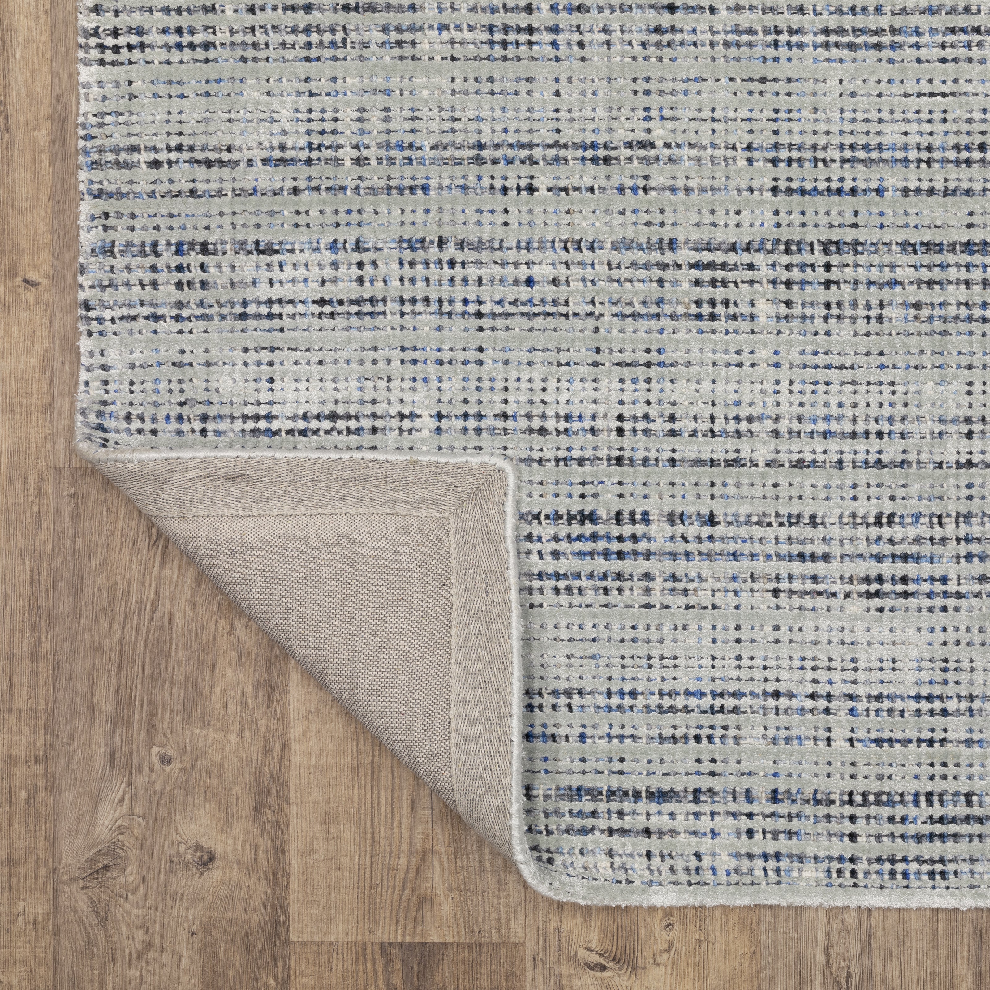 Oriental Weavers Circa CIR05 soft traditional rug featuring textured design in grey/ blue tones