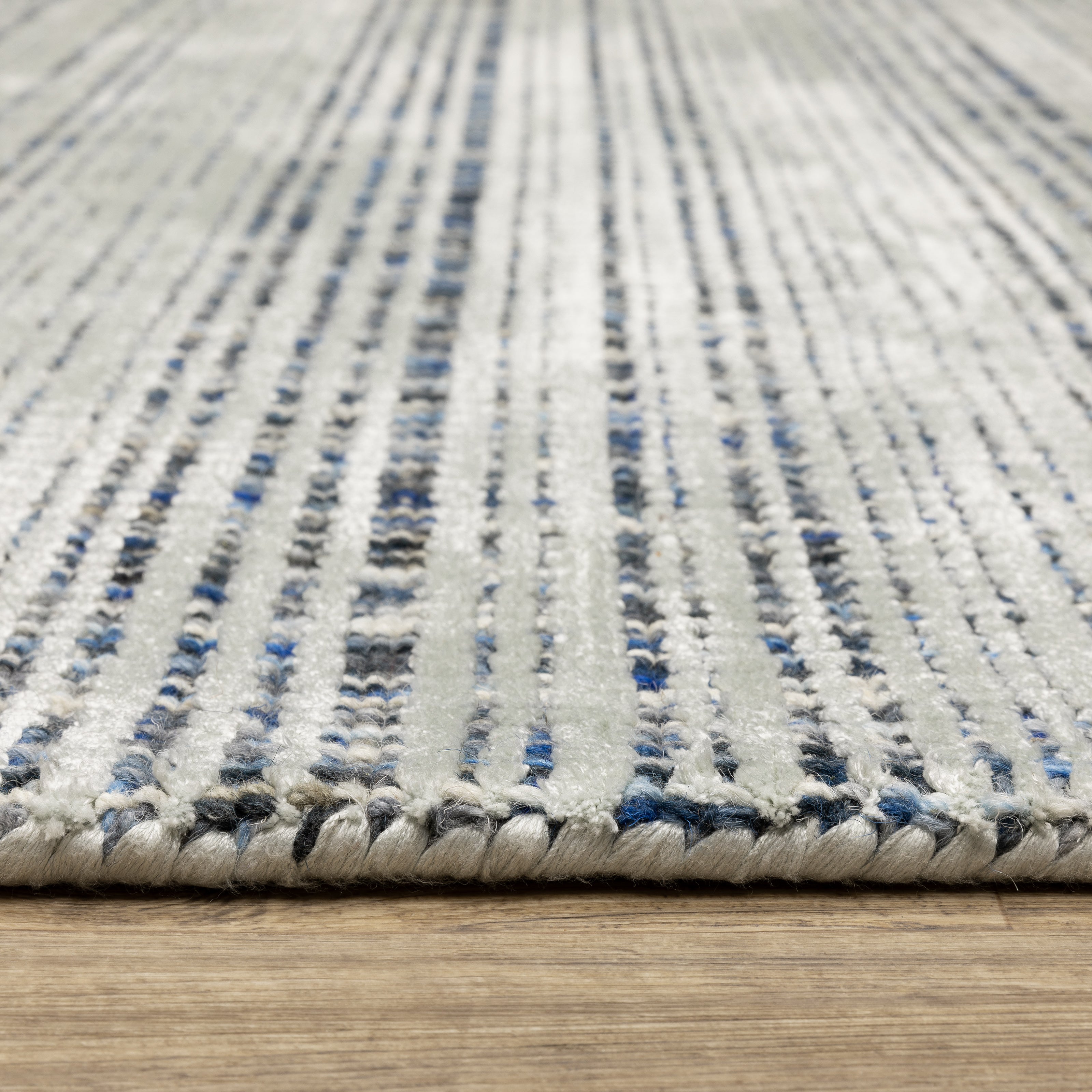 Oriental Weavers Circa CIR05 soft traditional rug featuring textured design in grey/ blue tones