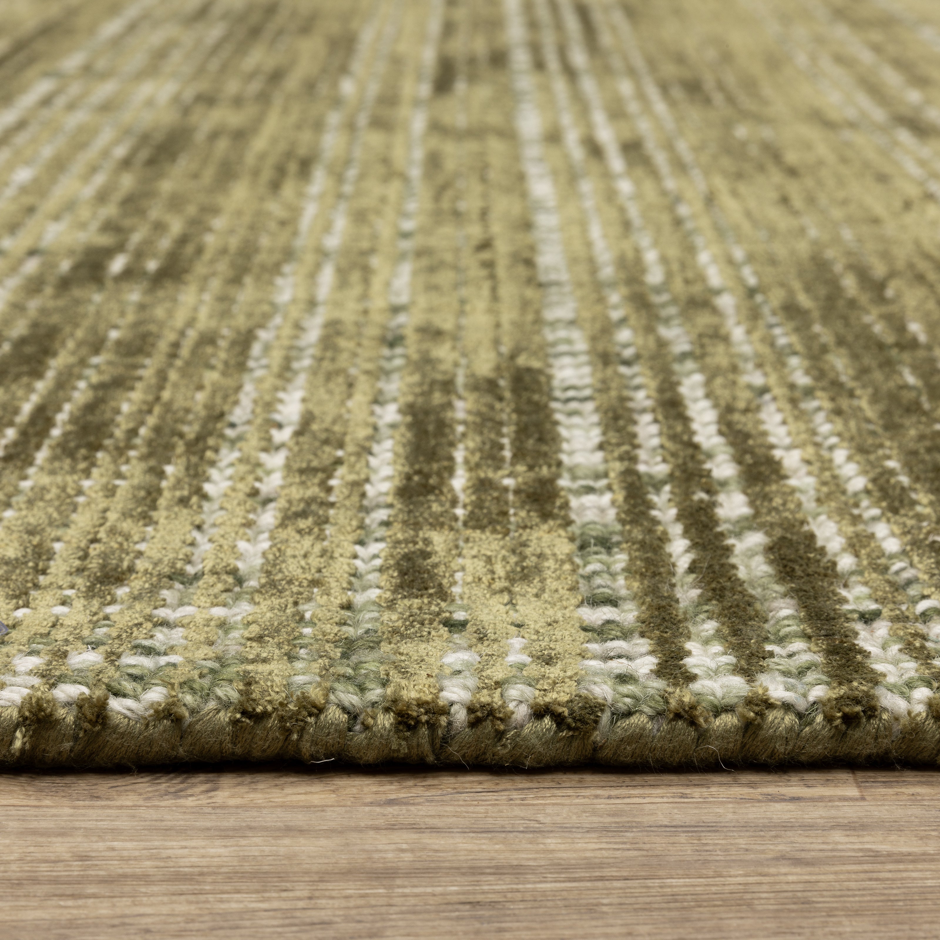 Oriental Weavers Circa CIR07 soft area rug featuring textured design in green/ ivory tones