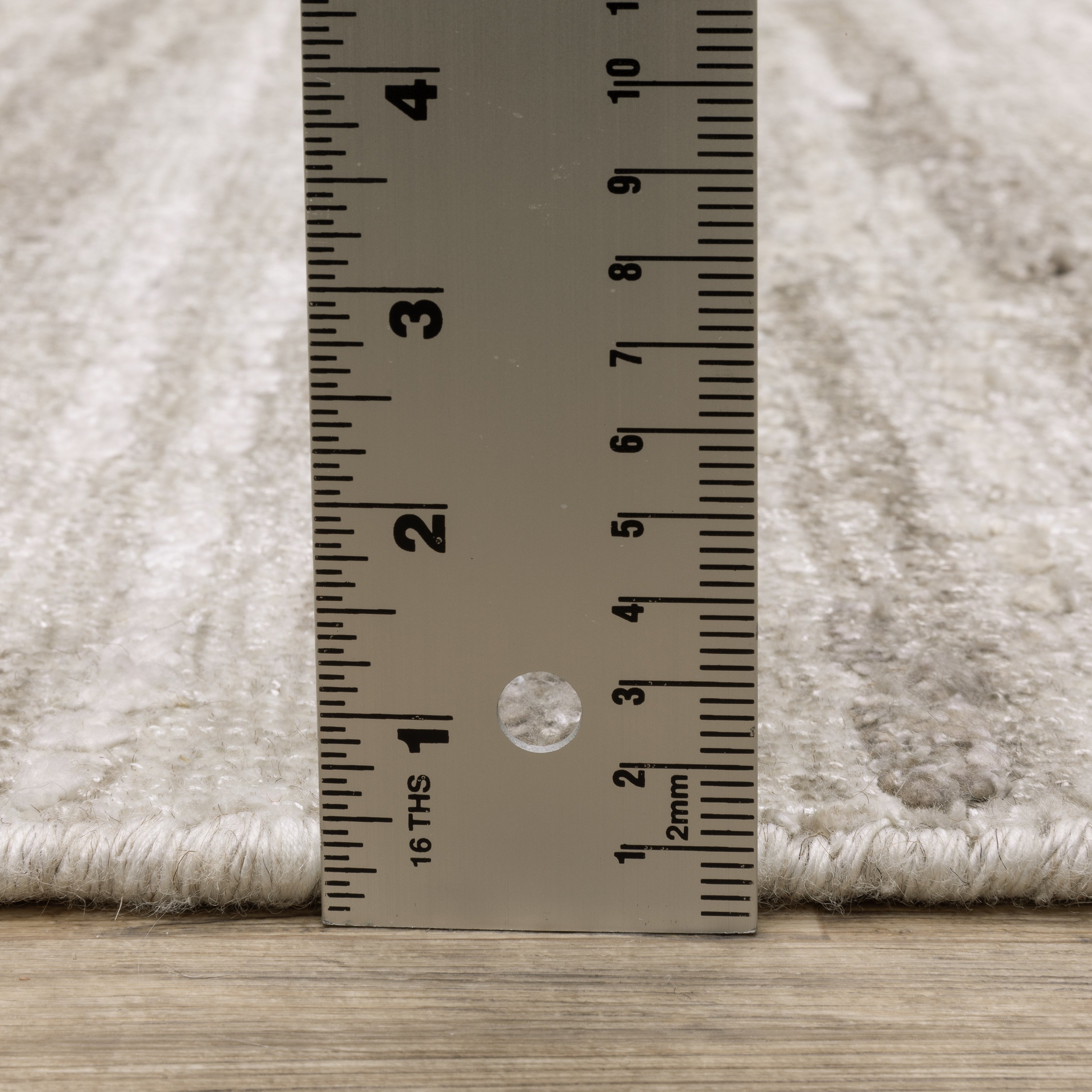 Oriental Weavers Clarke CLA01 soft modern rug featuring abstract pattern in beige/ brown tones