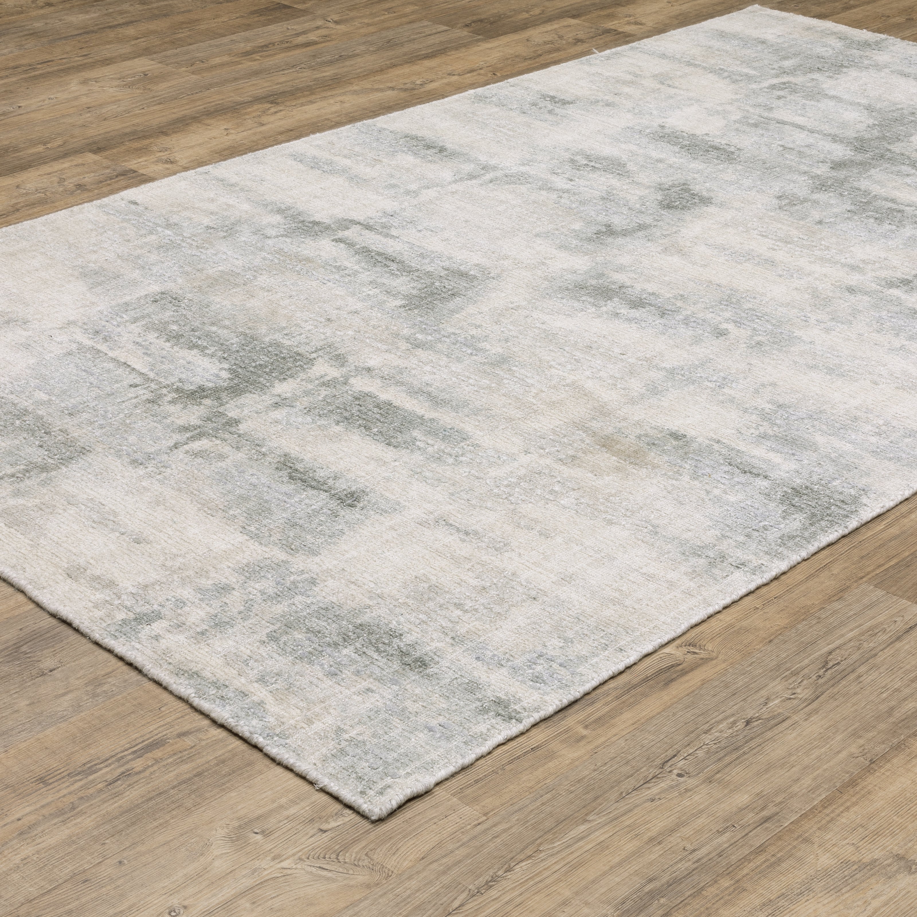 Oriental Weavers Clarke CLA05 soft modern rug featuring abstract pattern in beige/ grey tones