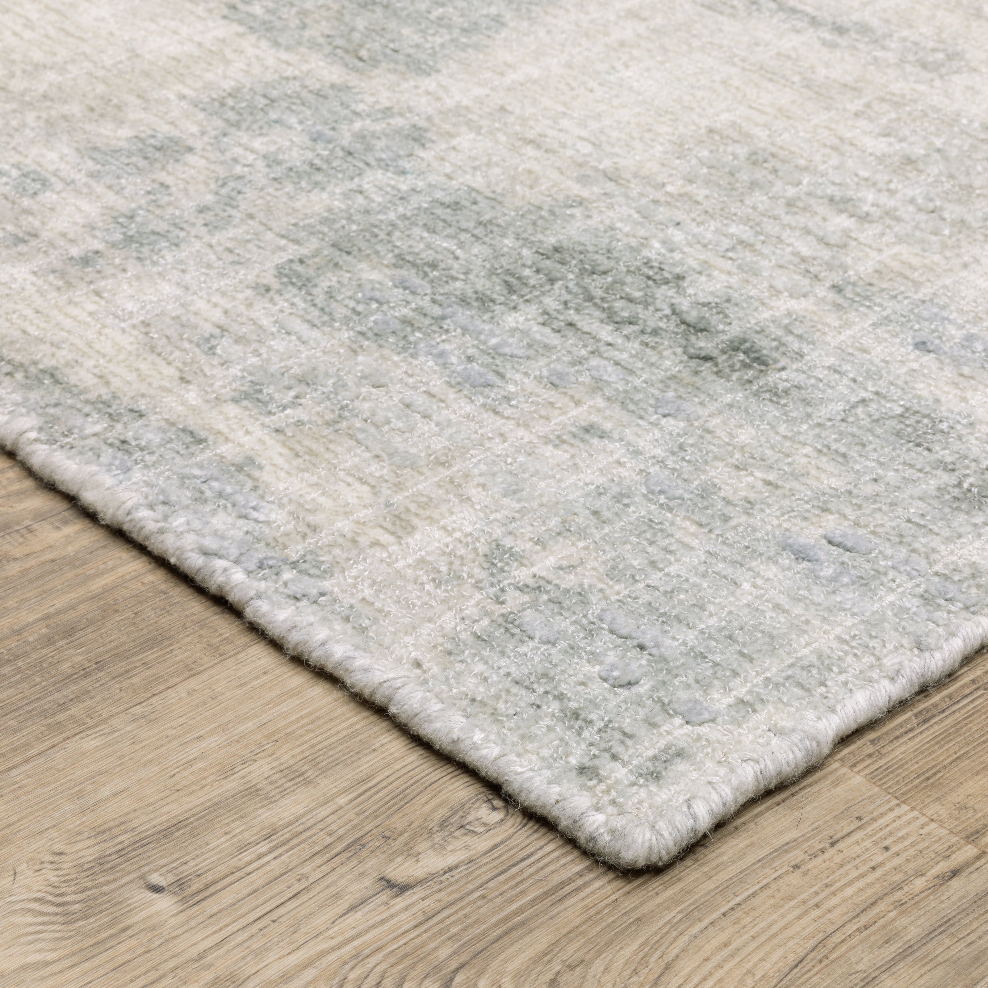 Oriental Weavers Clarke CLA05 soft modern rug featuring abstract pattern in beige/ grey tones