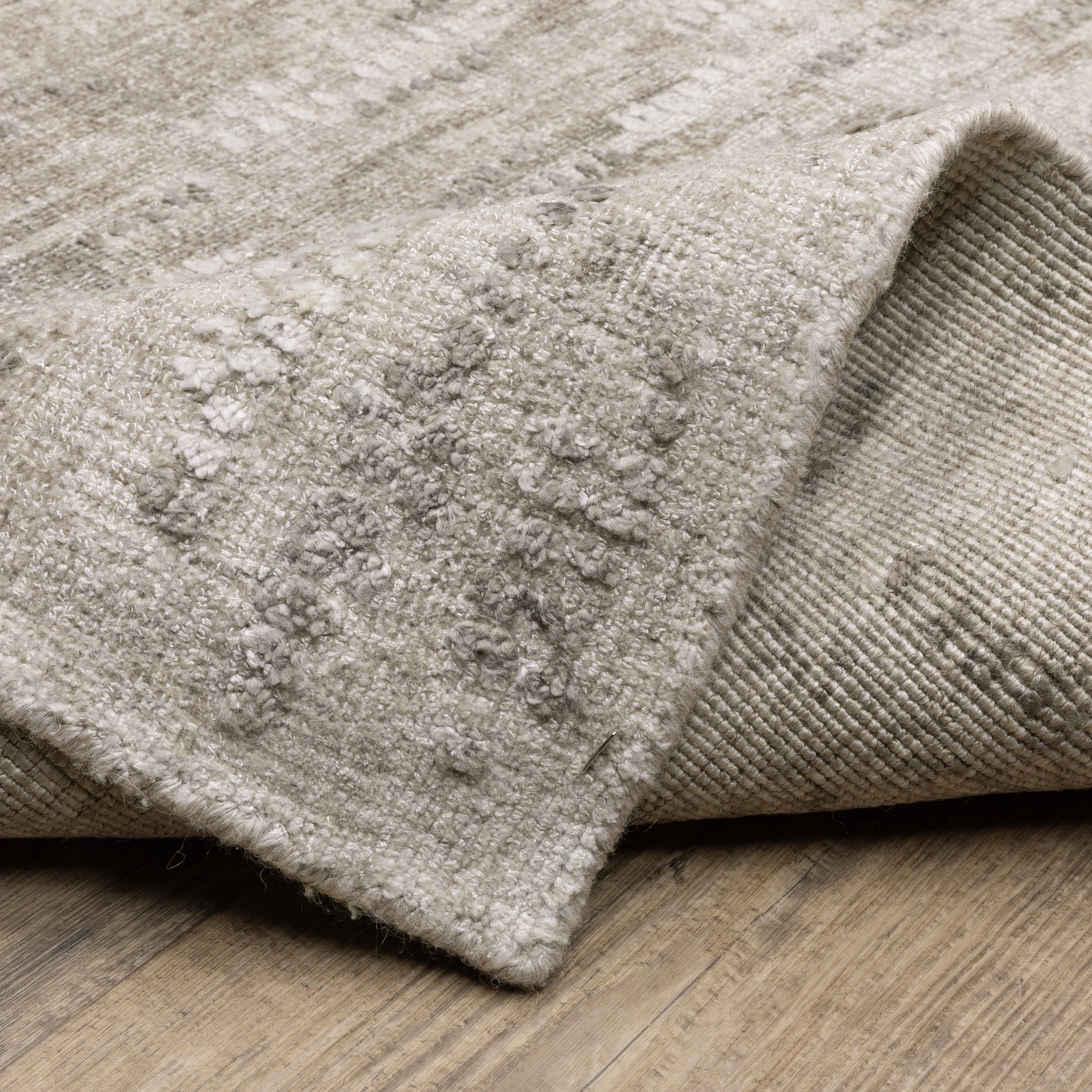 Oriental Weavers Clarke CLA08 soft modern rug featuring abstract pattern in beige/ brown tones