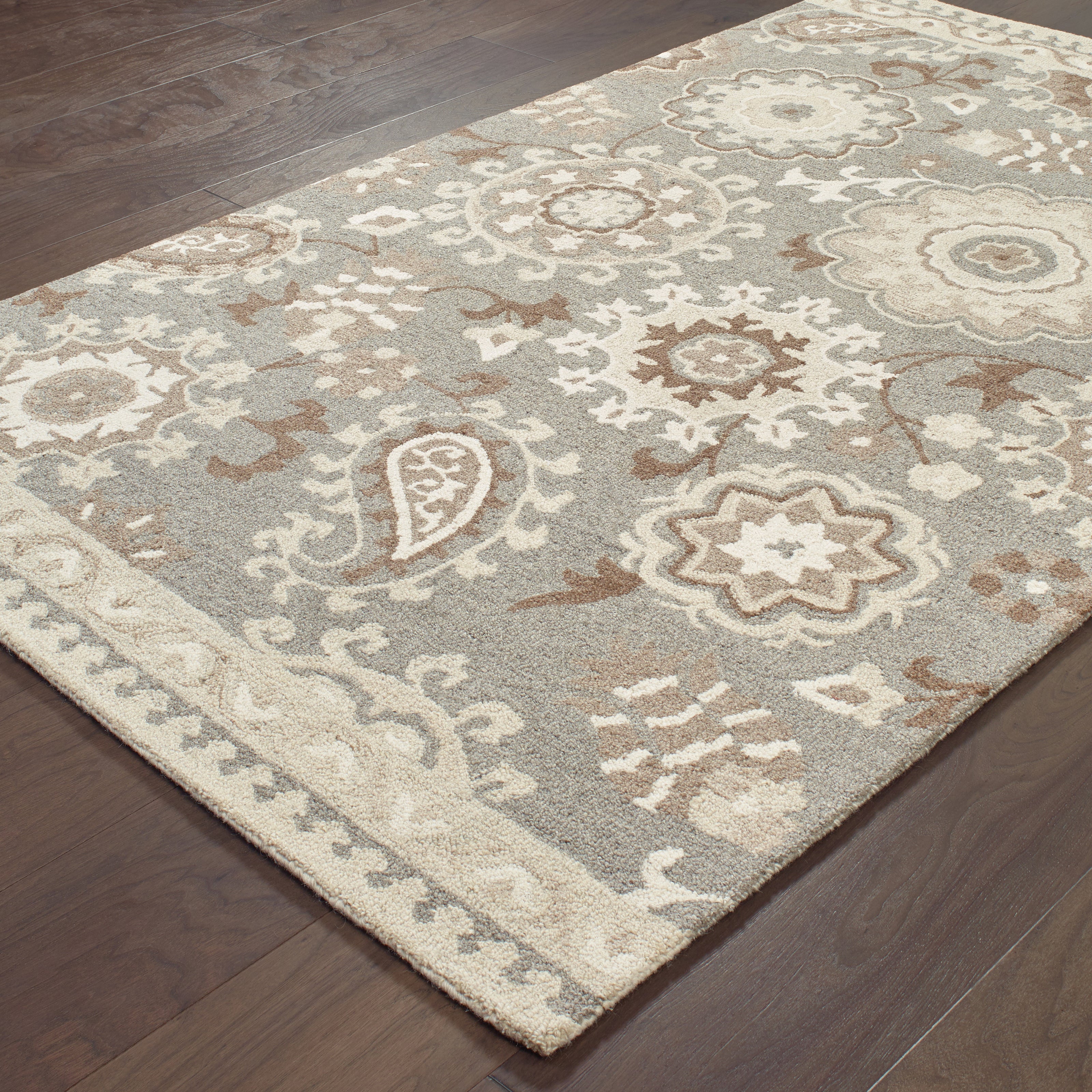 Oriental Weavers Craft 93003 soft traditional rug featuring decorative pattern in grey/ sand tones
