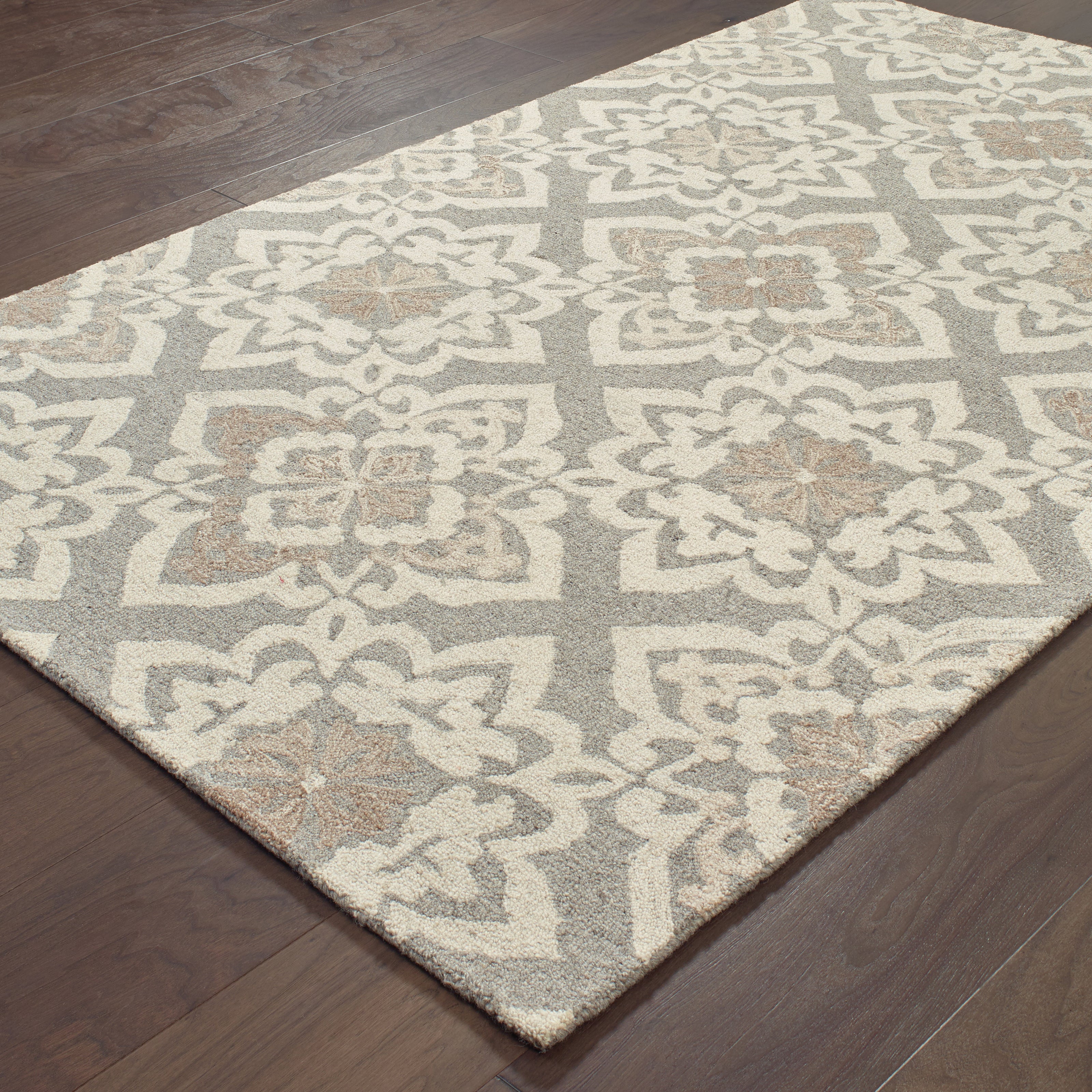 Oriental Weavers Craft 93004 soft traditional rug featuring decorative pattern in grey/ sand tones