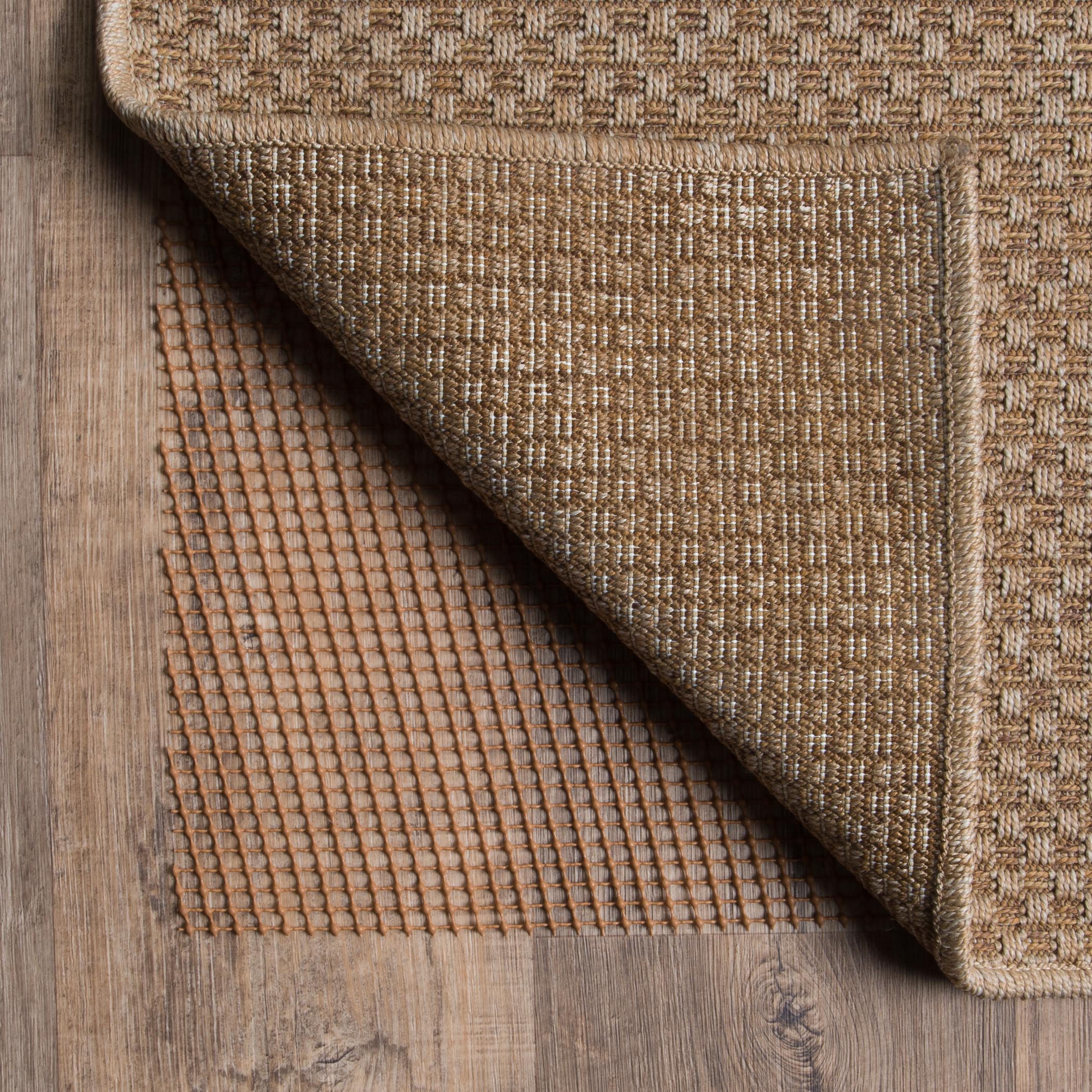 All Weather Outdoor 0007C Brown Rug Pad, brown outdoor rug pad designed for airflow, faster drying, and added rug stability.