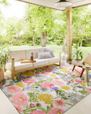 Power-loomed area rug from the Loloi Botanical Collection featuring oversized, romantic floral patterns in a vintage-inspired palette; suitable for indoor and outdoor use.