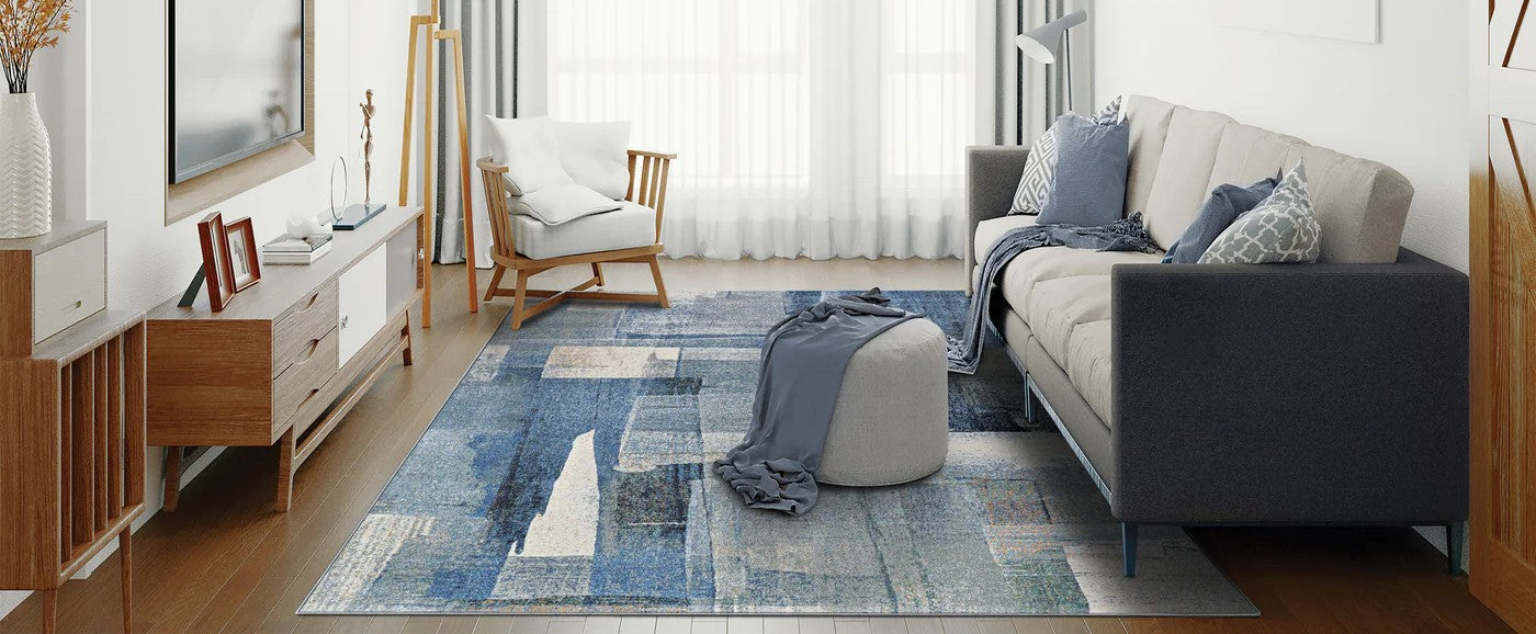 Elegant modern area rug by Couristan, showcasing a bold contemporary pattern, displayed in a stylish, inviting living room setting