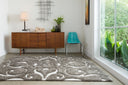 Neutral earth tone shag rug from the Loloi Enchant Collection featuring bold oversized patterns and a luxurious high-low textured finish.