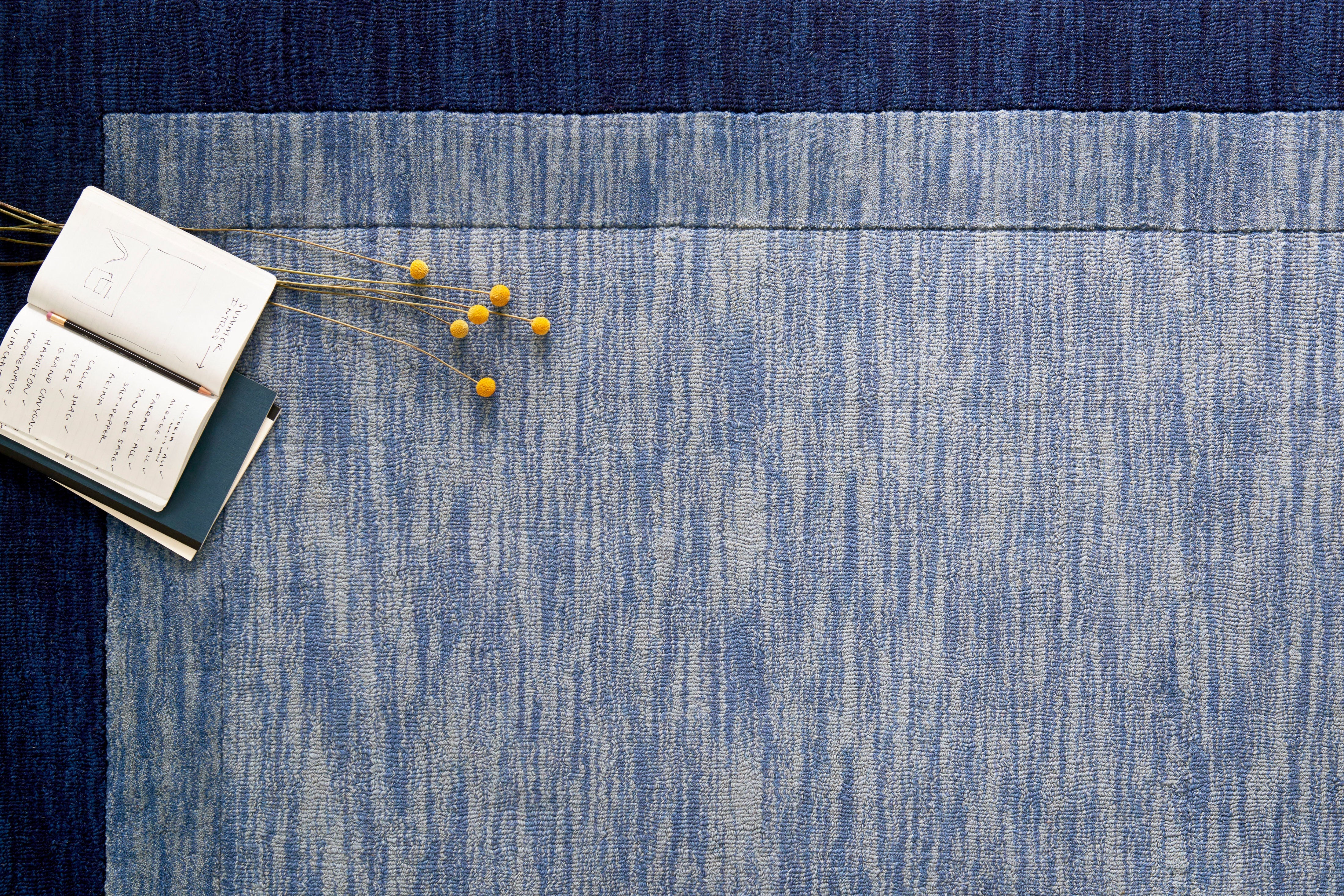 Hand-tufted Loloi Hamilton rug with subtle bordered design, crafted from 100% wool and ethically certified by Good Weave.