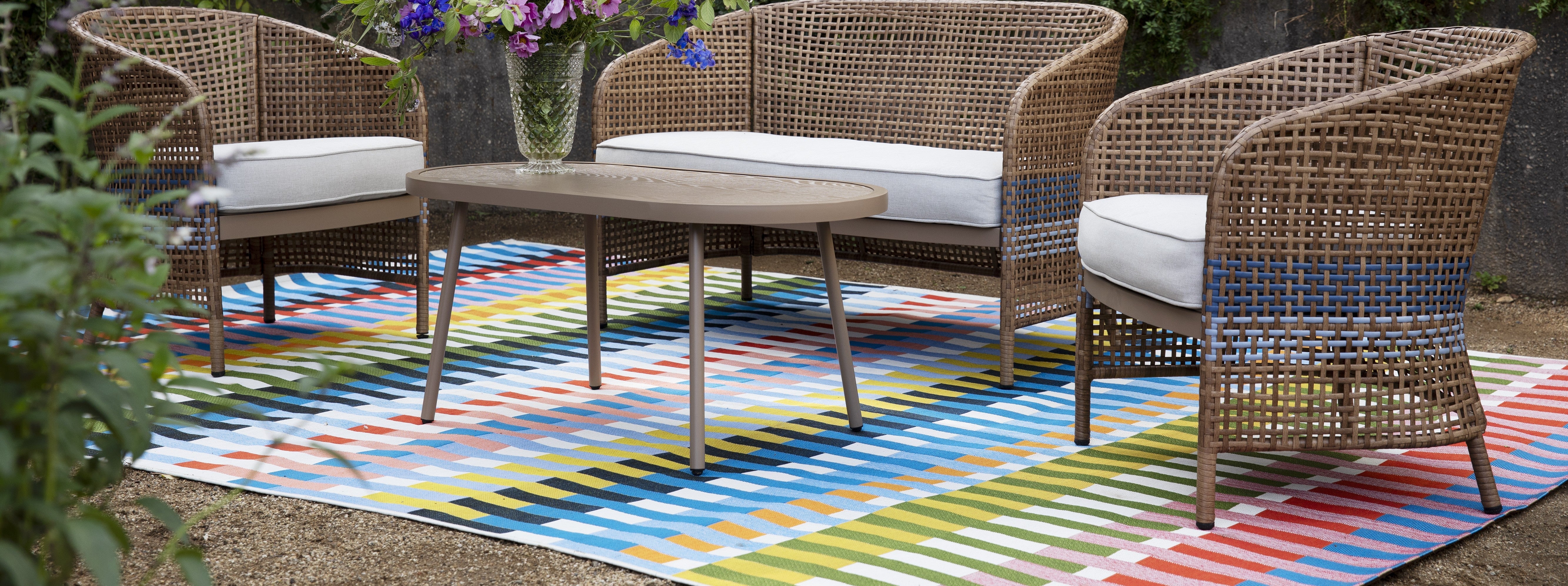 Vibrant Novogratz x Momeni Icon Collection rug featuring bold Mid-Century Modern patterns, colorful geometric and botanical motifs, durable for indoor and outdoor spaces