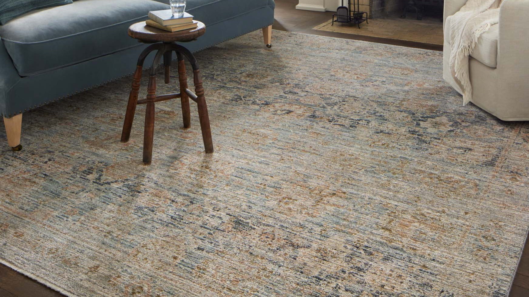 Jean Stoffer x Loloi collection area rugs—durable polyester, jute, and cotton in classic, vintage, and modern styles for timeless elegance in any space.