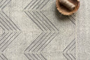 Elegant 100% wool rug from the Kopa Collection, showcasing intricate linear patterns in a low-profile design, hand-tufted by skilled artisans in India.