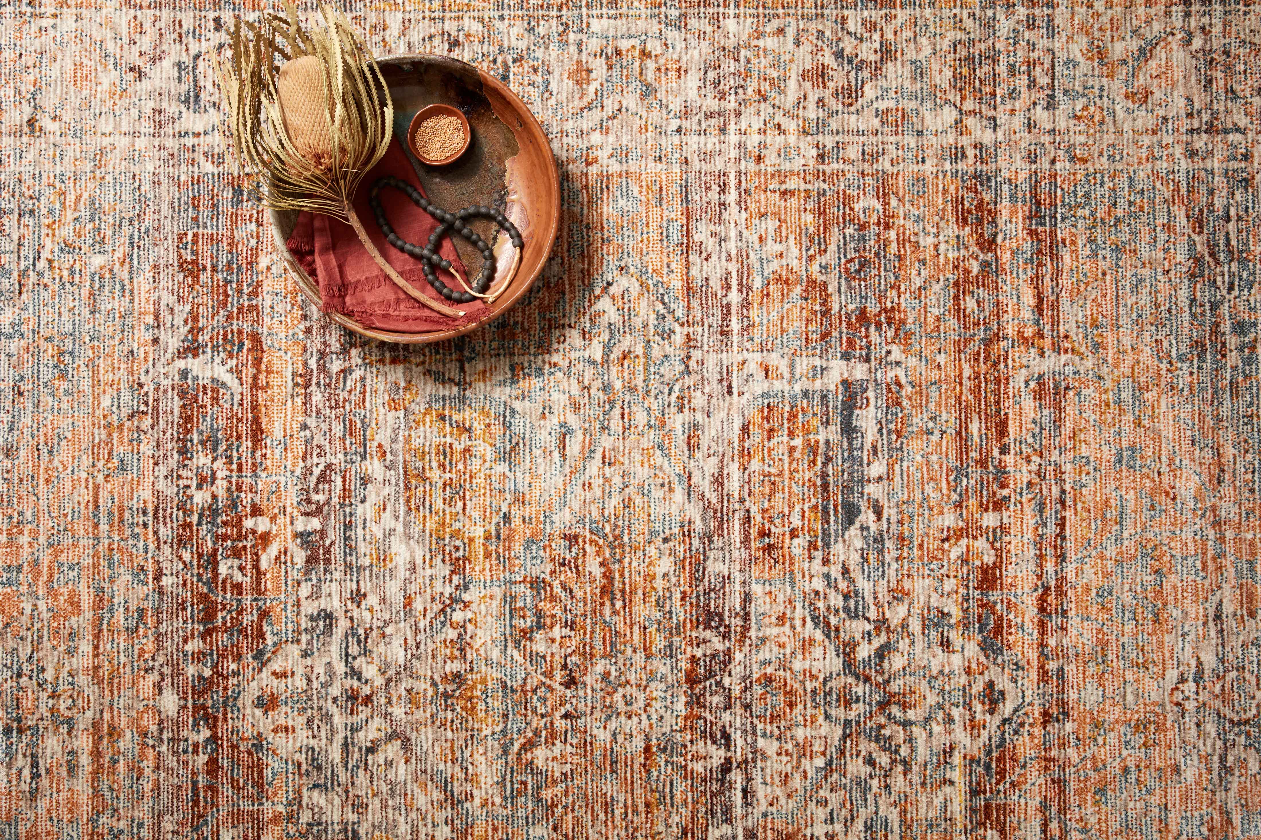 Elegant Loloi Lourdes rug with intricate old-world patterns, warm and moody colors, and a soft pile—perfect for adding timeless style to any room.
